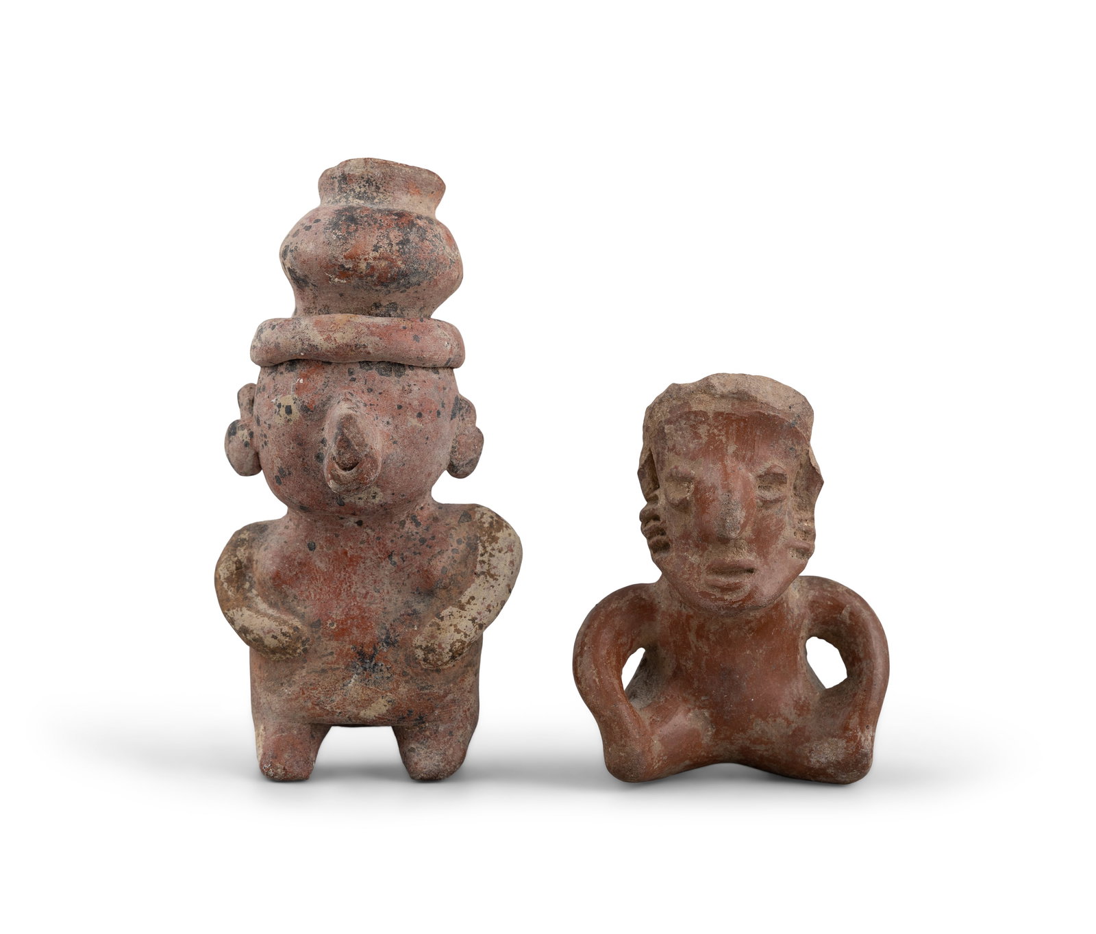 TWO PRE-COLUMBIAN POTTERY FIGURES one sitting and one standing, the largest 15cm high. (1 of 3)