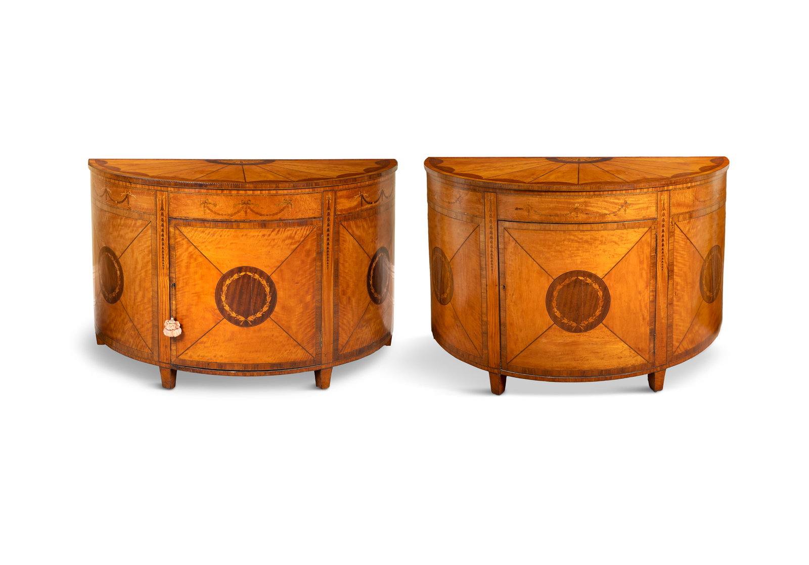 A FINE PAIR OF GEORGE III D-SHAPED HARDWOOD AND ROSEWOOD INLAID COMMODES, IN THE MANNER OF WILLIAM (1 of 9)