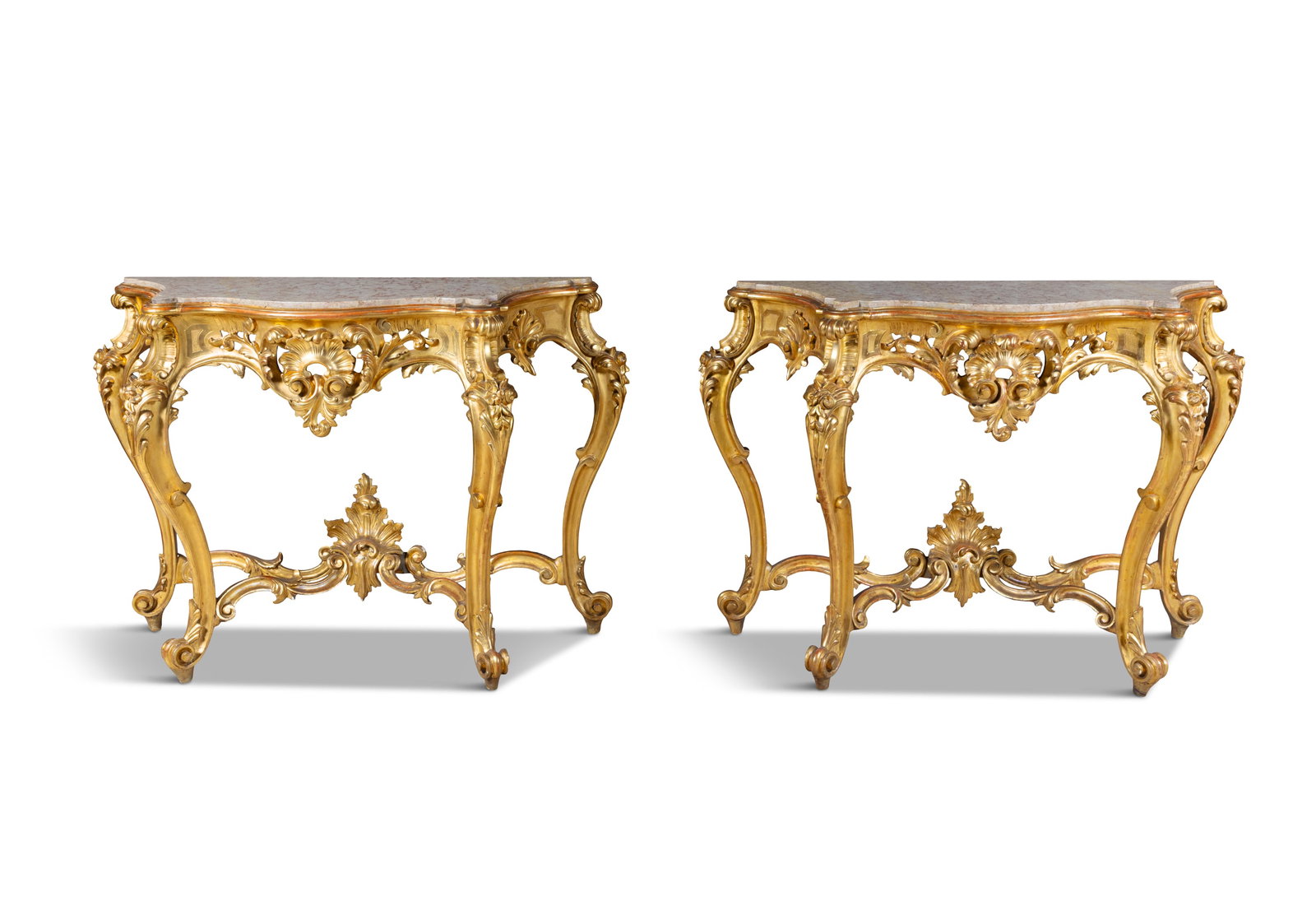 A PAIR OF 19TH CENTURY MARBLE TOP GILTWOOD CONSOLE TABLES, of serpentine form, the pierced apron (1 of 8)