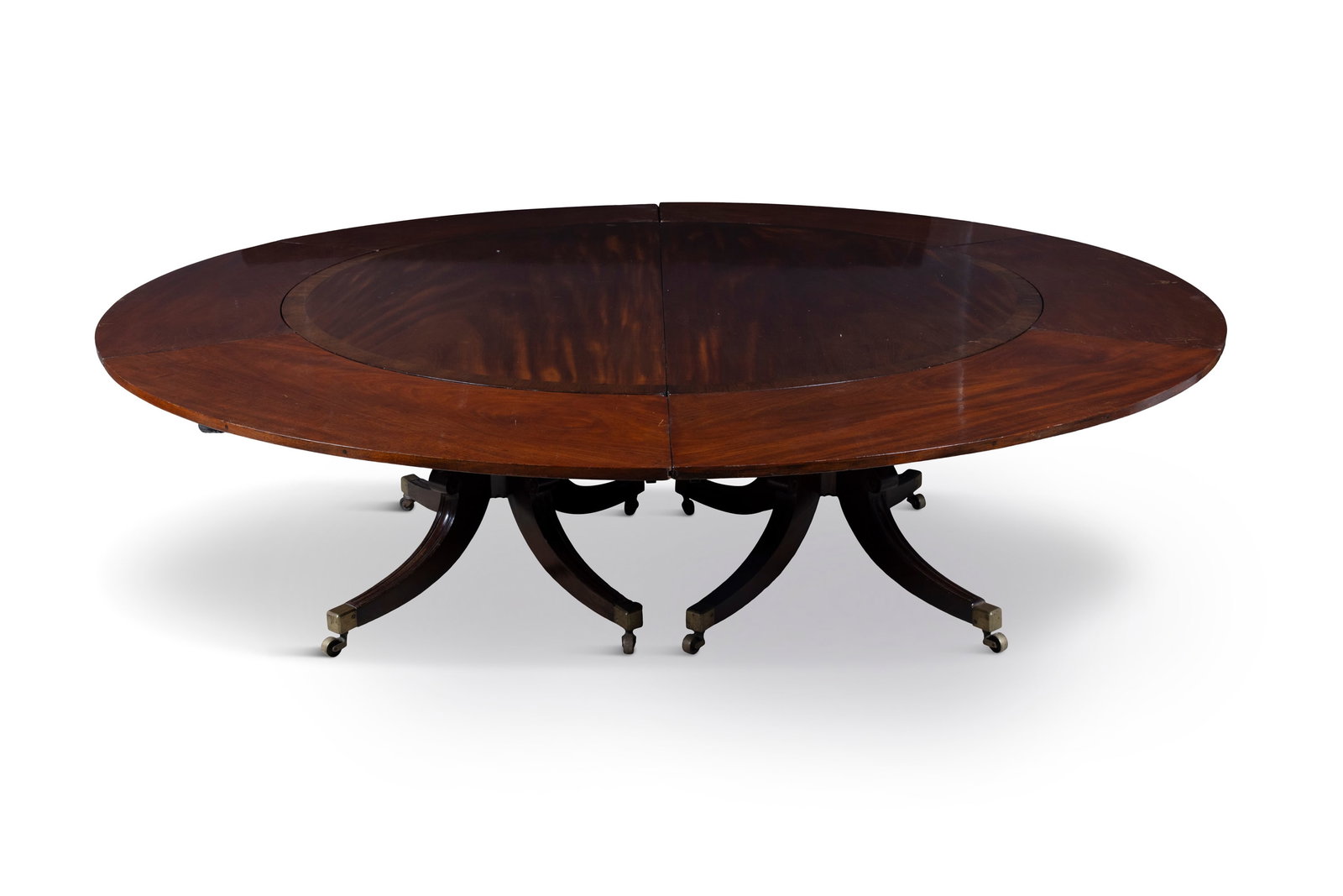 A WILLIAM IV MAHOGANY AND ROSEWOOD BANDED EXTENDING JUPE STYLE TABLE, of circular form, with six (1 of 6)