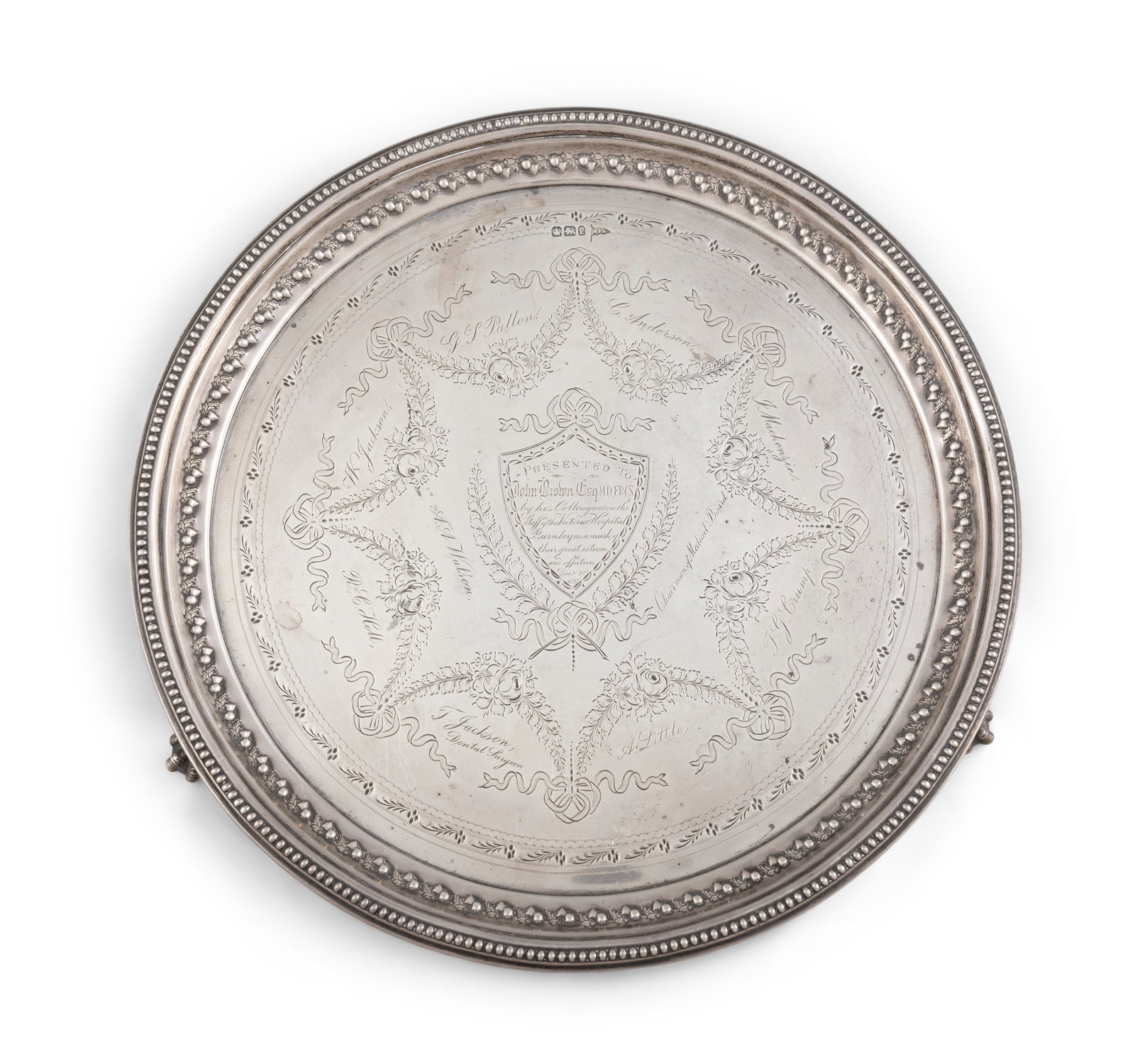A SILVER PRESENTATION SALVER Sheffield, c.1897, mark of Walker & Hall, of circular form, with (1 of 4)