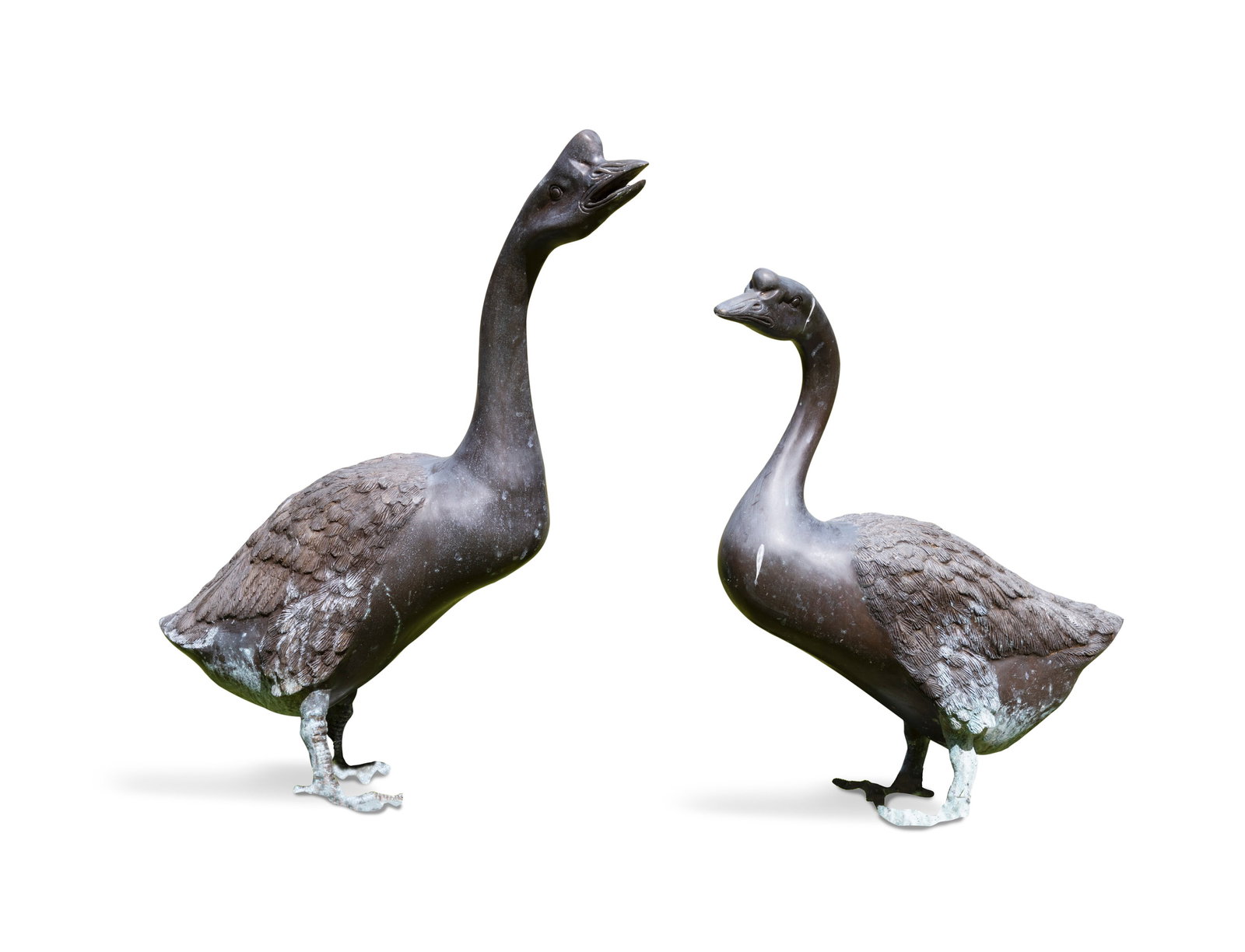 A PAIR OF BRONZE GEESE, the bigger example, 70cm high (1 of 4)