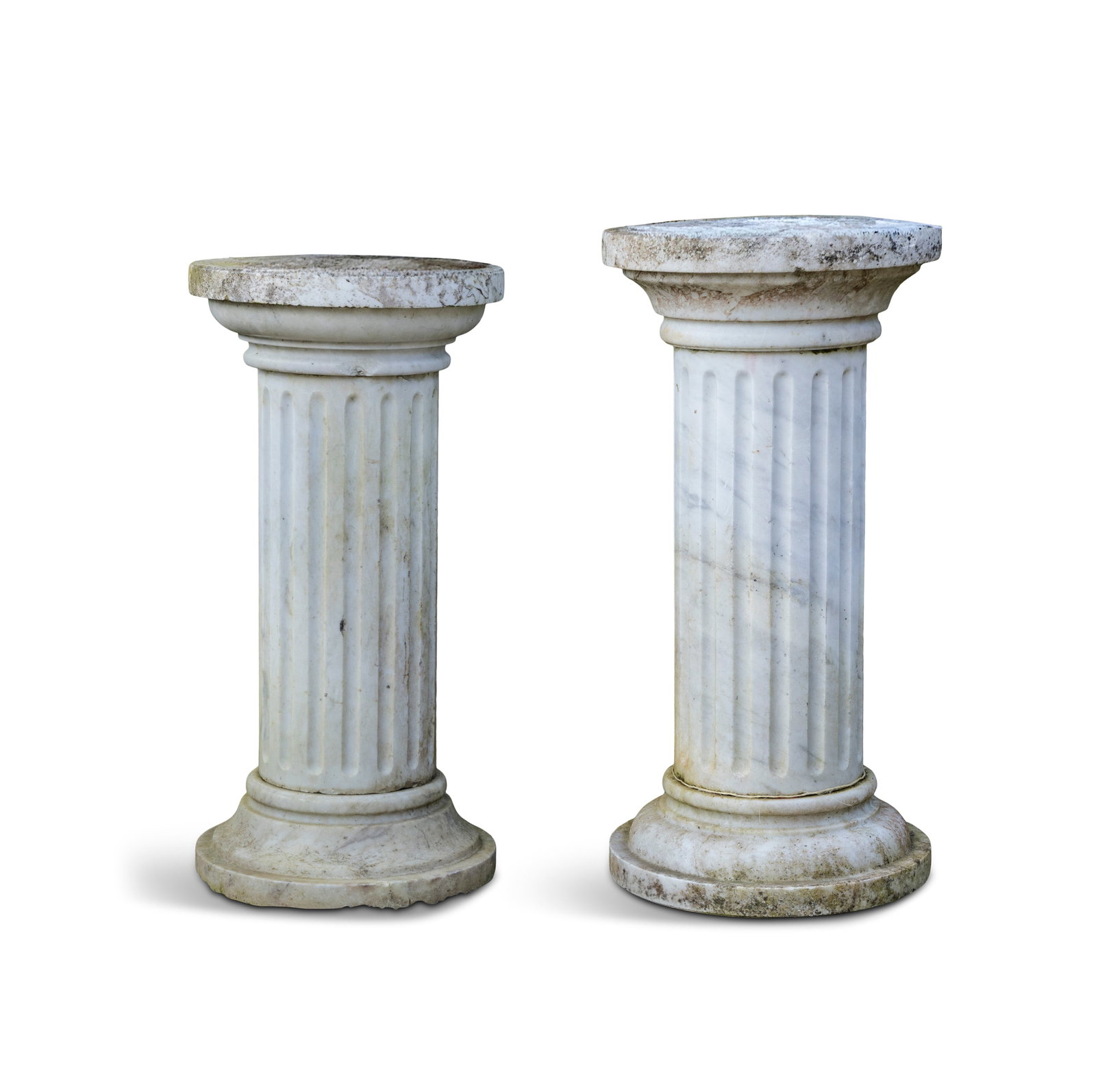 A PAIR OF CARVED WHITE MARBLE COLUMN PEDESTALS, 18TH/19TH CENTURY the circular tops above fluted (1 of 4)