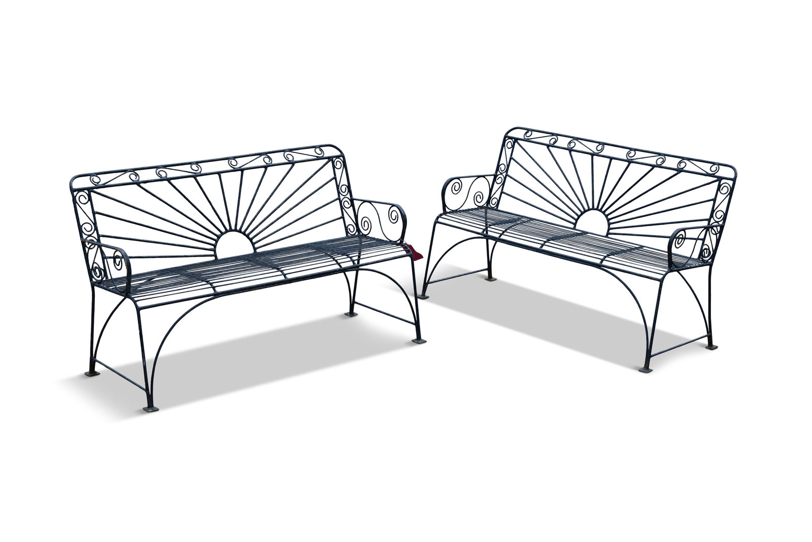 A PAIR OF STATE BLUE WIRE-WORK GARDEN BENCHES, three seater examples with spiral work designs and: A PAIR OF STATE BLUE WIRE-WORK GARDEN BENCHES, three seater examples with spiral work designs and sunburst motif to backrest, 183cm high, 142cm wide, 44cm high to seat