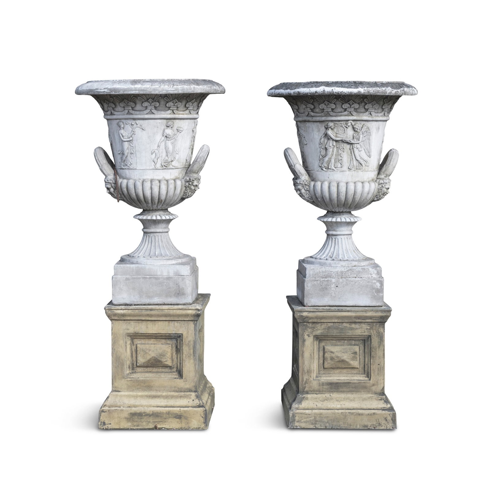 A PAIR OF LARGE COMPOSITE CREAM PAINTED CAMPAGNA GARDEN URNS, each with out turned rims,: A PAIR OF LARGE COMPOSITE CREAM PAINTED CAMPAGNA GARDEN URNS, each with out turned rims, demi-fluted and decorated with bands of classical figures, having twin human mask handles, on socle bases on a 