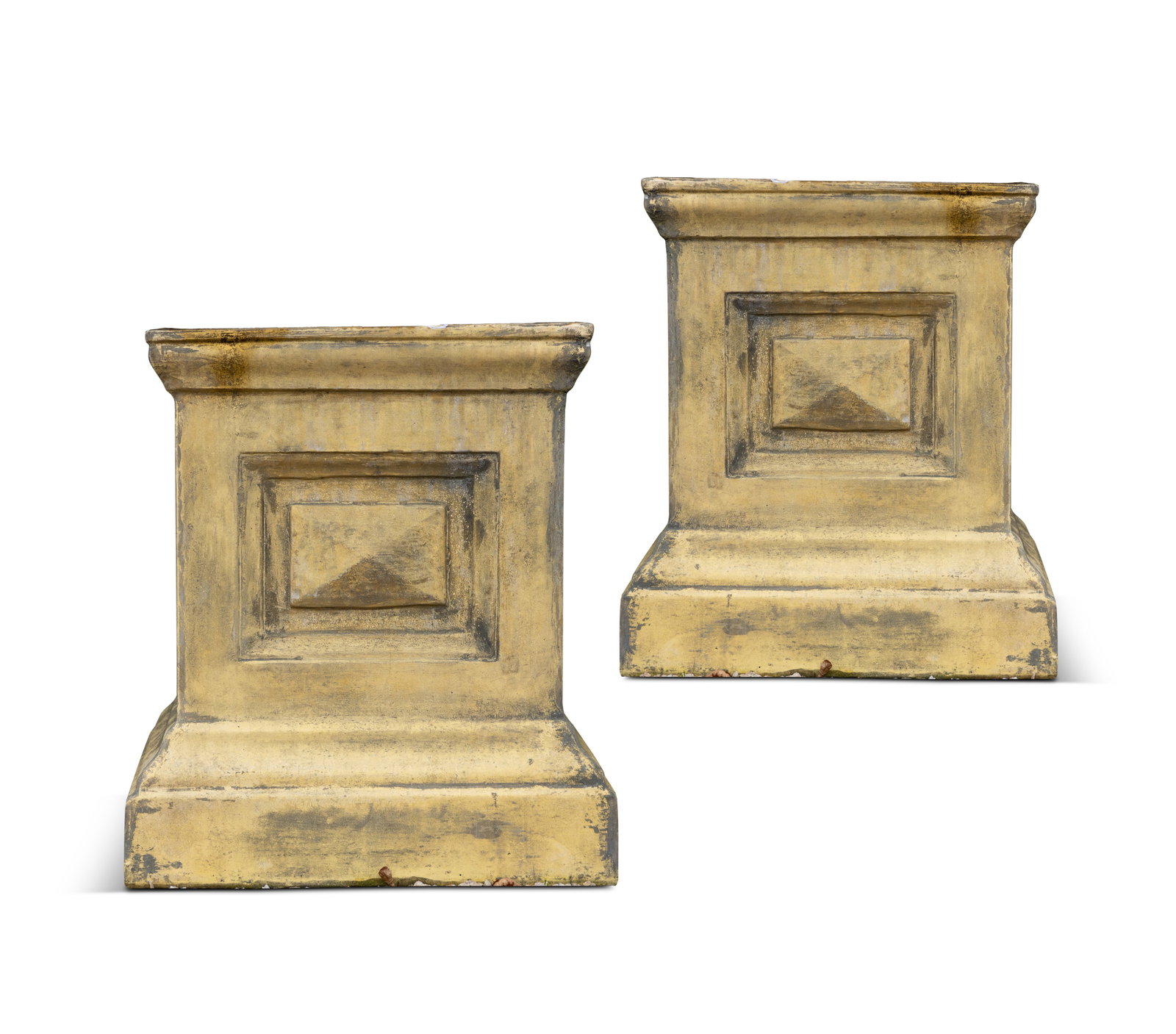 A PAIR OF YELLOW PAINTED STONE PLINTHS, of upright square form, with fielded sides on an outstepped (1 of 2)