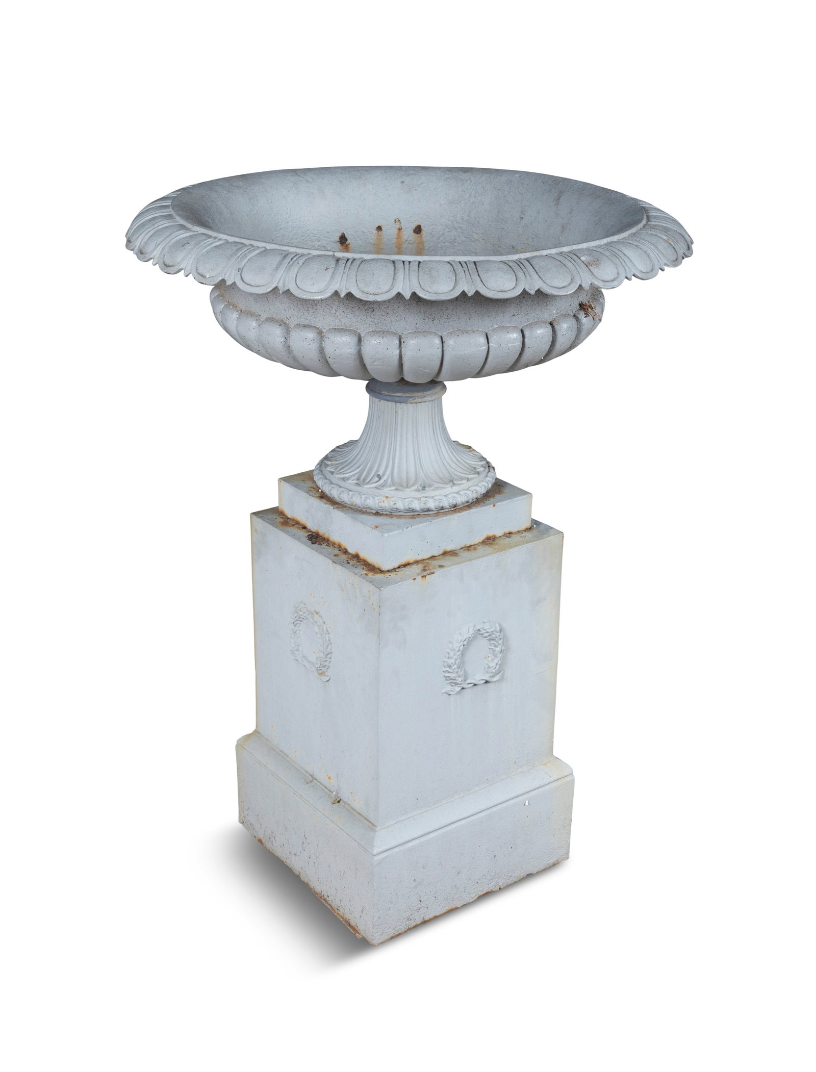 A LARGE VICTORIAN CAST IRON URN OF CLASSICAL DESIGN, painted in gunmetal grey with turnover rim: A LARGE VICTORIAN CAST IRON URN OF CLASSICAL DESIGN, painted in gunmetal grey with turnover rim and lobed body, on waisted leaf cast foot and plinth base, 95cm diameter