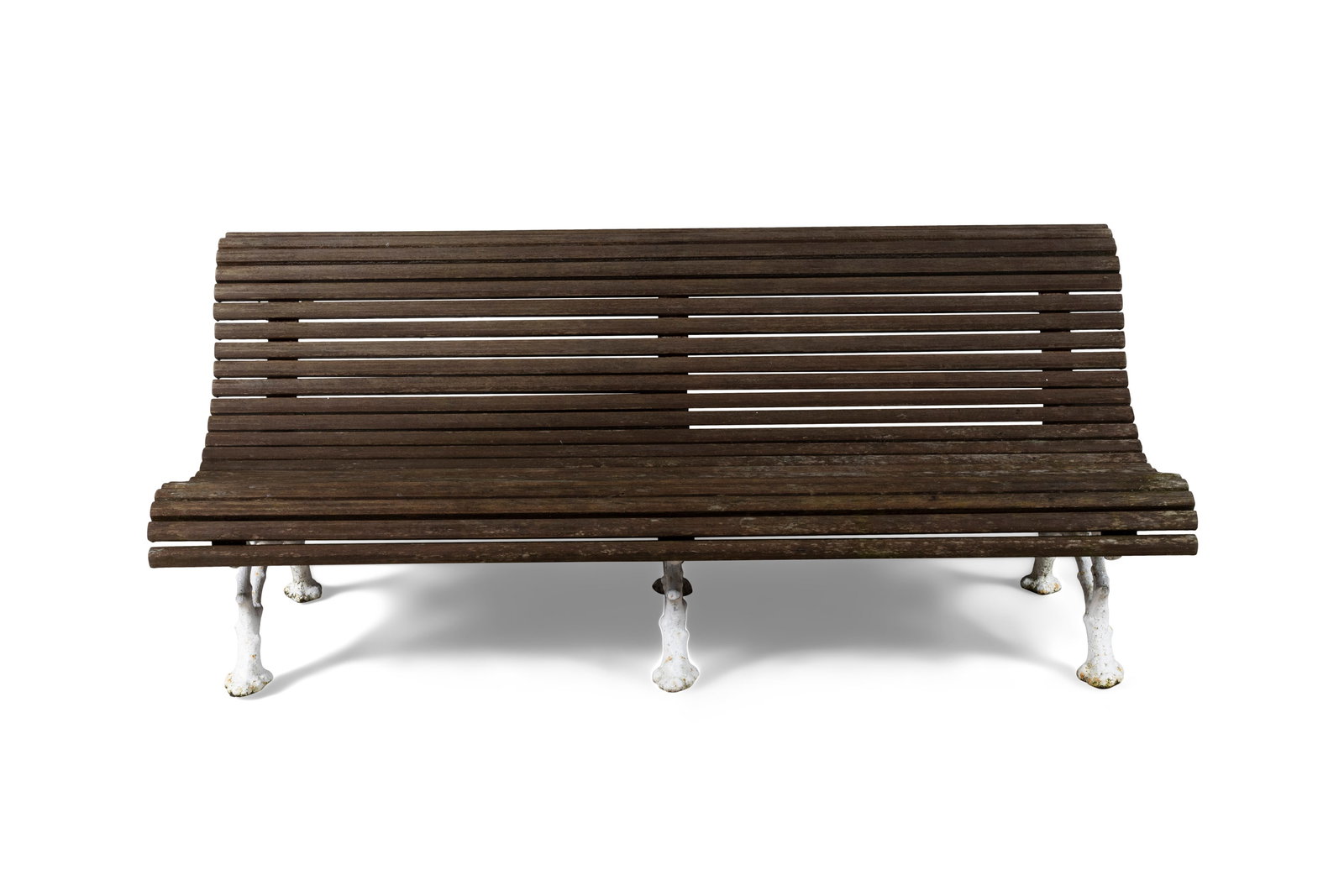 A VICTORIAN GARDEN BENCH, with arched slatted timber back and seat, raised on a white painted cast (1 of 5)