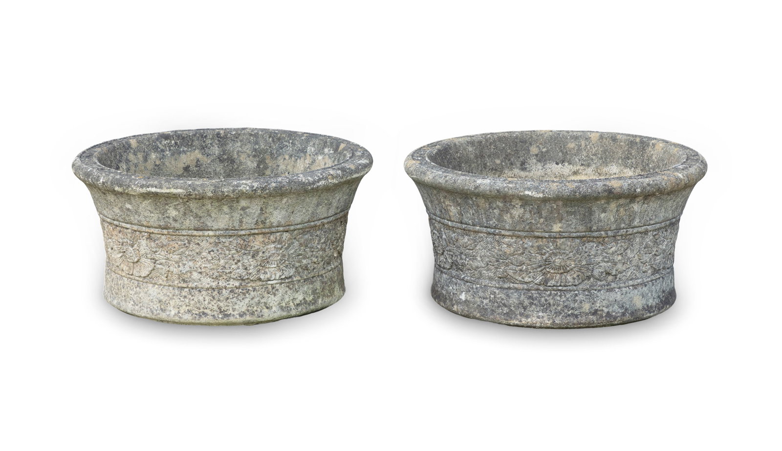 A PAIR OF FLARED RIM CYLINDRICAL CAST CONCRETE GARDEN PLANTERS, the concave sides with decorative: A PAIR OF FLARED RIM CYLINDRICAL CAST CONCRETE GARDEN PLANTERS, the concave sides with decorative floral band and interior marked Willowstone T10 with drainage hole to base, 26.5cm high 51cm diameter 