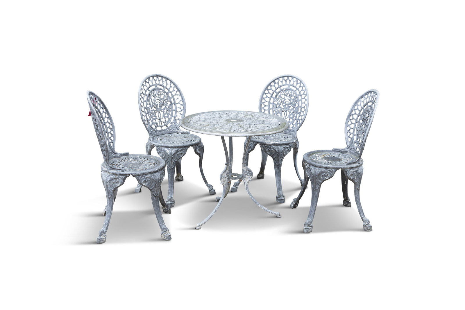 A SET OF FOUR ZINC GARDEN CHAIRS AND CIRCULAR TABLE oval pierced backs and seats on cast (1 of 4)