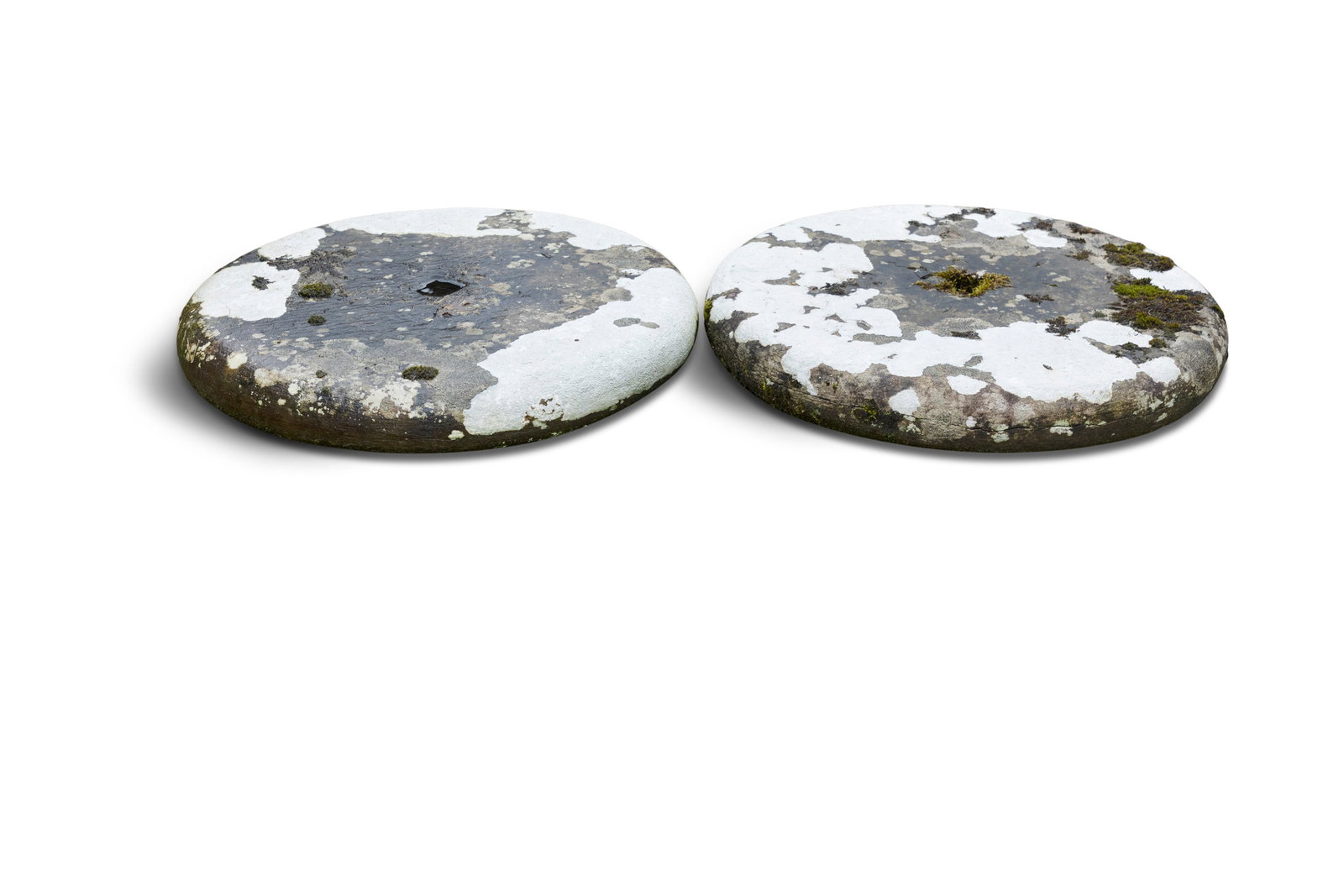 A PAIR OF LIMESTONE CAPS, each of moulded circular form, 18cm high, 68cm high Provenance: Mourne: A PAIR OF LIMESTONE CAPS, each of moulded circular form, 18cm high, 68cm high Provenance: Mourne Park, Co. Down