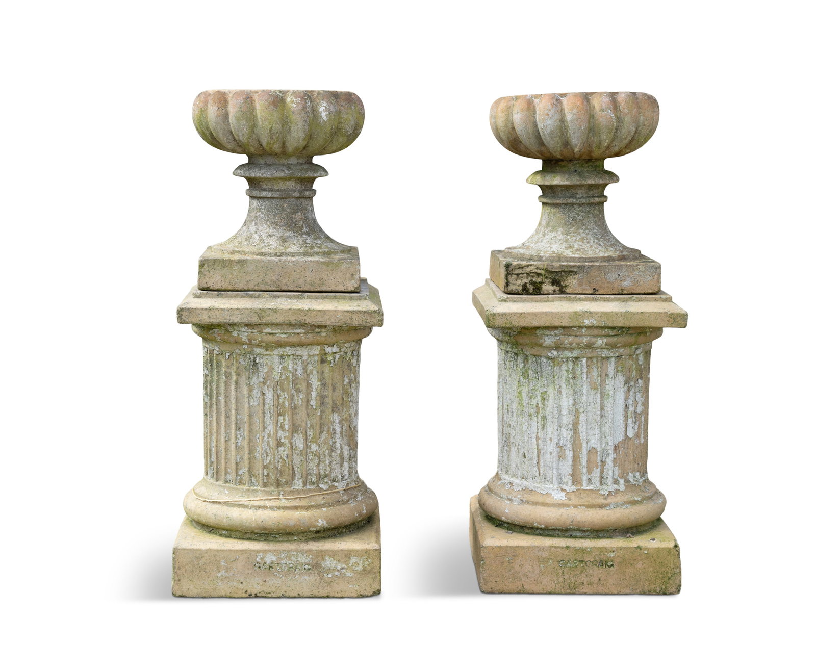 A PAIR OF SCOTTISH GARTCRAIG FIRE CLAY PEDESTALS, the square rimmed tops above fluted cylindrical (1 of 3)