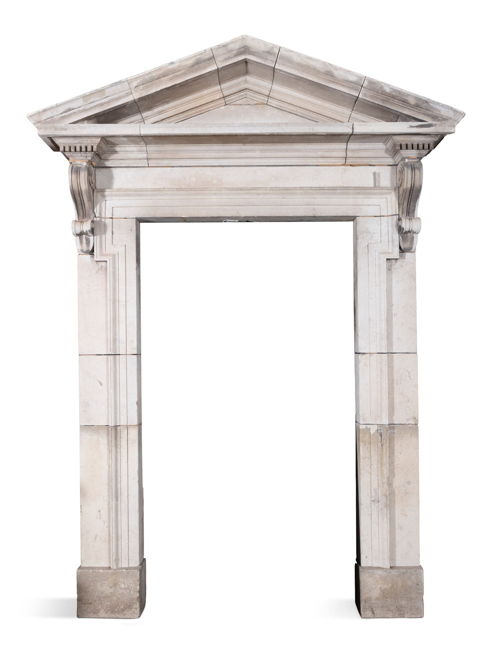 A PORTLAND STONE NEOCLASSICAL DOORCASE, LATE 19TH CENTURY, the moulded pediment top above a dentil: A PORTLAND STONE NEOCLASSICAL DOORCASE, LATE 19TH CENTURY, the moulded pediment top above a dentil frieze surmounted by scroll capitals and rectangular bases, 366cm high, 100cm wide, 60cm deep