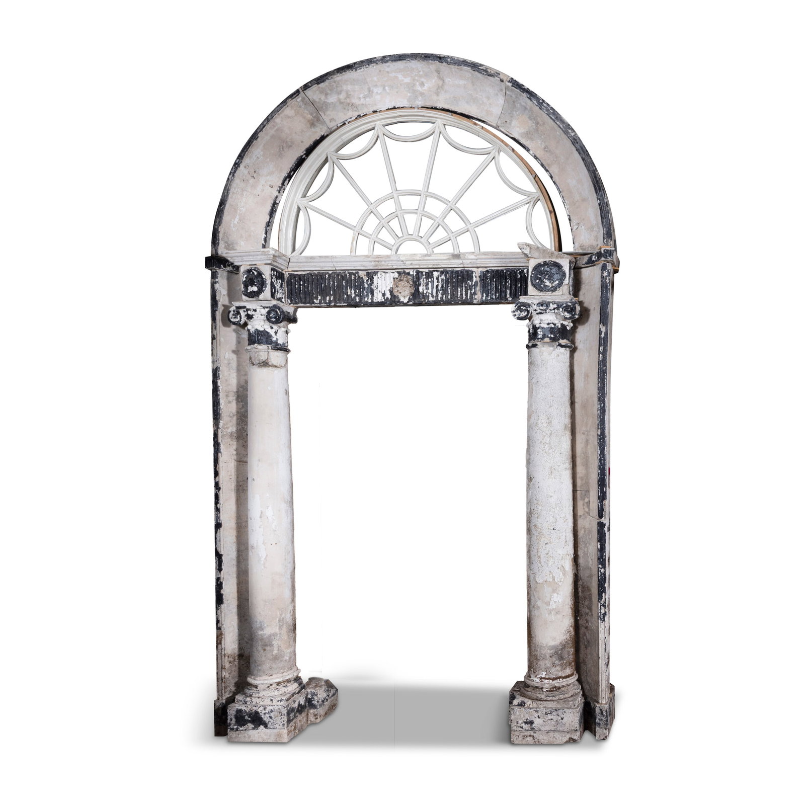A GEORGE III BLACK AND WHITE PAINTED PORTLAND STONE DOOR CASE, LATE 18TH CENTURY, the concaved arch (1 of 2)
