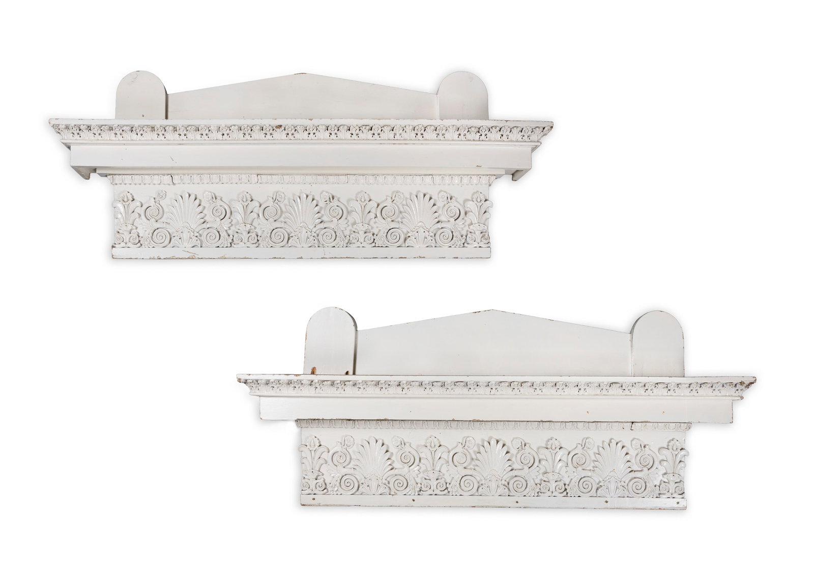 A PAIR OR CARVED AND WHITE PAINTED PINE DOOR CAPITALS, an architectural pedestal outset cornice,: A PAIR OR CARVED AND WHITE PAINTED PINE DOOR CAPITALS, an architectural pedestal outset cornice, with carved acanthus leaf decoration, over egg and dart moulding. 168cm wide
