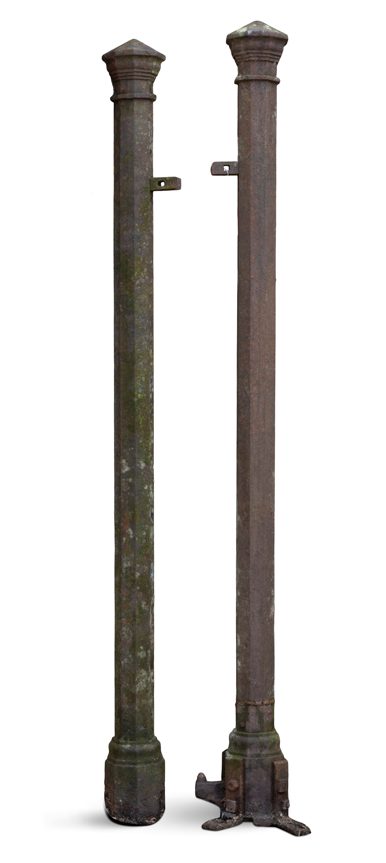 A PAIR OF CAST IRON HEXAGONAL GATE PILLARS, 19TH CENTURY, the faceted, pointed tops above bevelled (1 of 2)