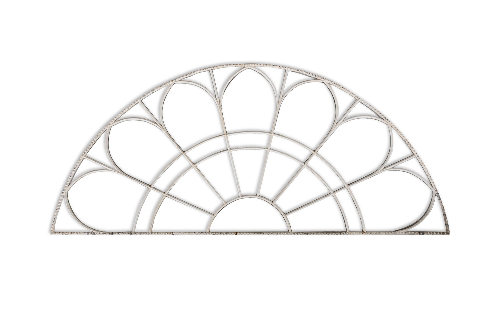 A WHITE PAINTED LEAD FAN LIGHT, of arched form with seven compartmented glazed sections. 66cm high,: A WHITE PAINTED LEAD FAN LIGHT, of arched form with seven compartmented glazed sections. 66cm high, 147cm wide