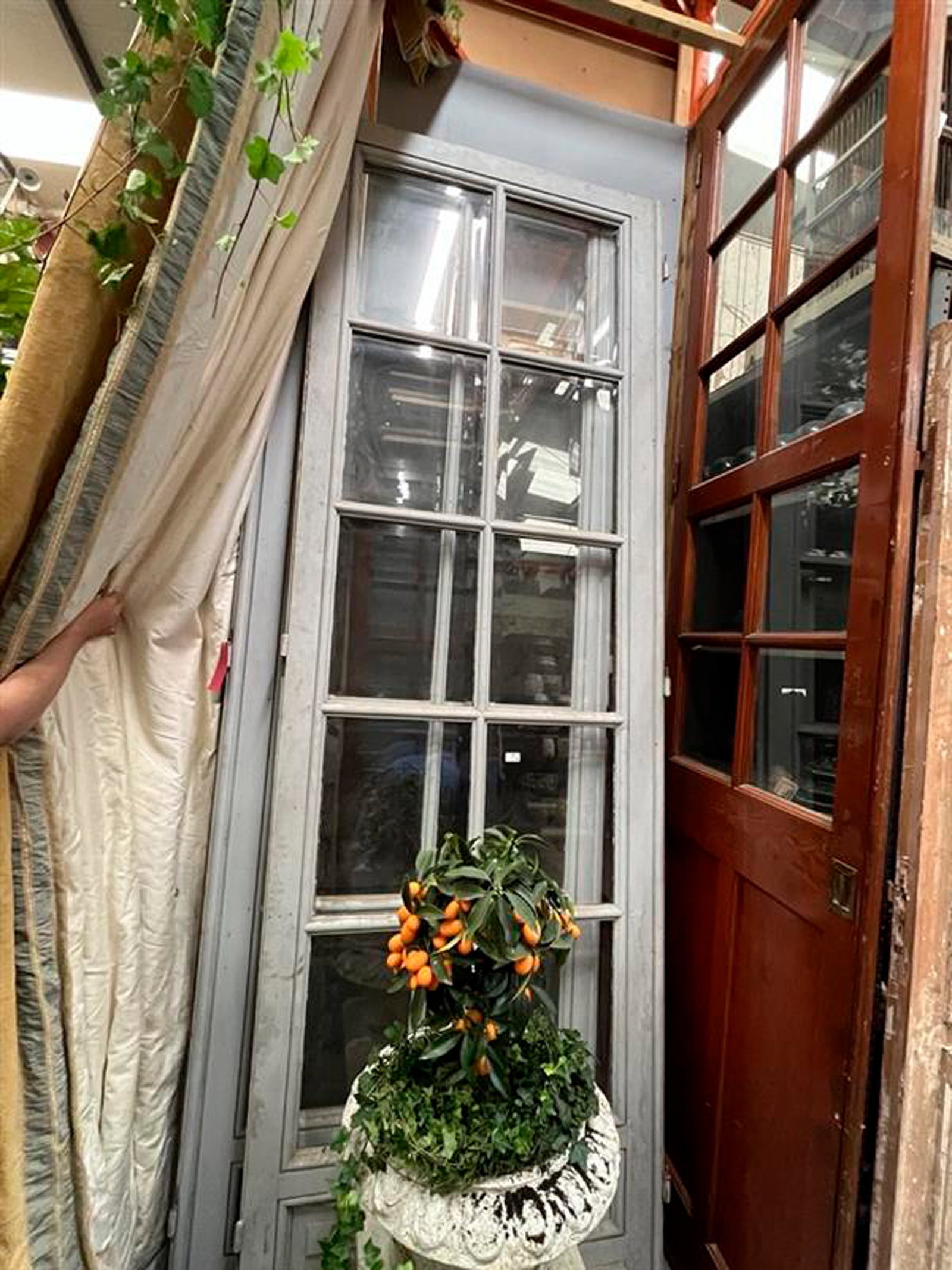 A LARGE PAIR OF TIMBER AND GLASS PANELLED DOORS, 303.5cm high x 103cm wide (1 of 2)