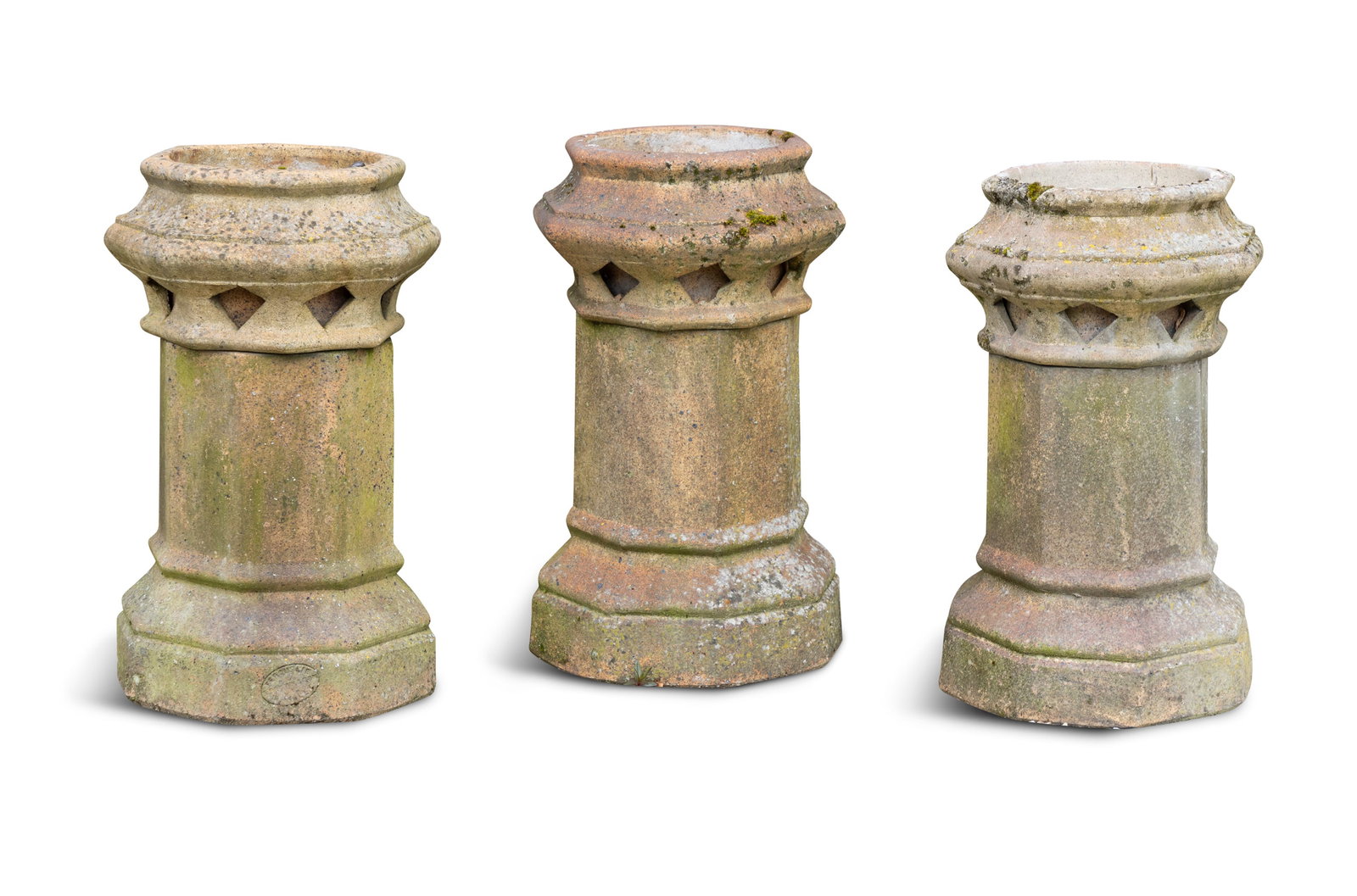 A SET OF THREE CHIMNEY FLUTES, of hexagonal form, 61cm high: A SET OF THREE CHIMNEY FLUTES, of hexagonal form, 61cm high
