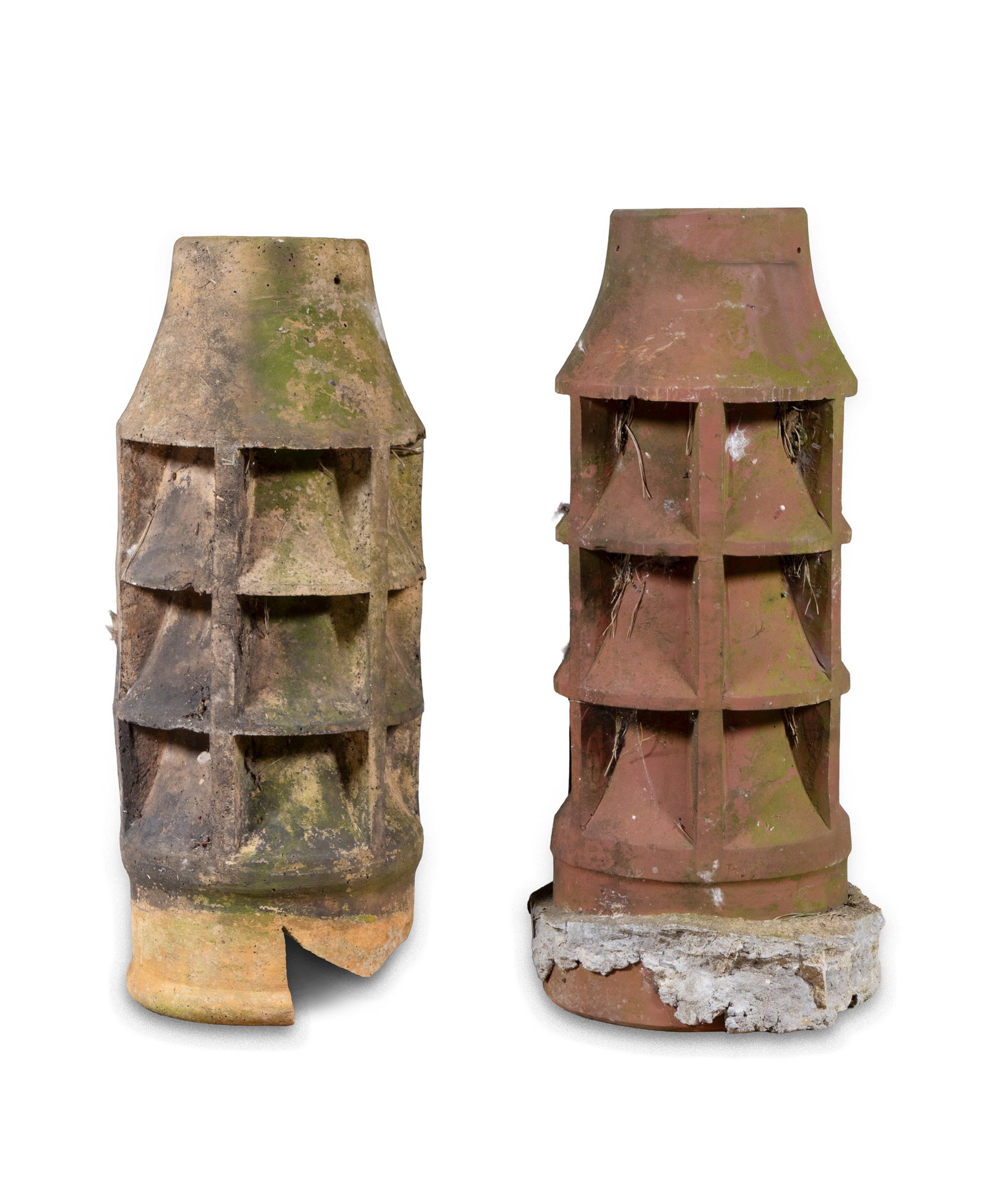 TWO TERRACOTTA CHIMNEY FLUTES, one attached to concrete base, the other with damage to base, both: TWO TERRACOTTA CHIMNEY FLUTES, one attached to concrete base, the other with damage to base, both with wire chimney guards to the top. c.70cm high