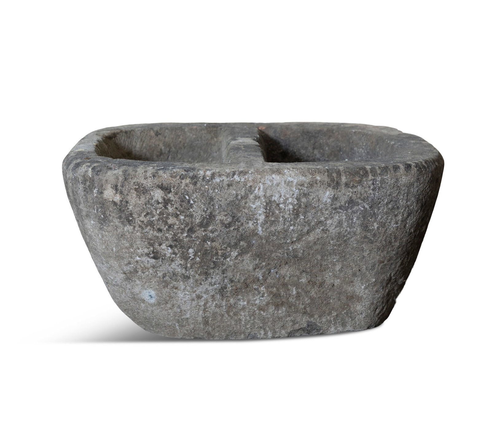 AN OVAL SHAPED LIMESTONE HOLY WATER FONT, with internal division, 22cm high, 49cm wide, 37cm deep: AN OVAL SHAPED LIMESTONE HOLY WATER FONT, with internal division, 22cm high, 49cm wide, 37cm deep