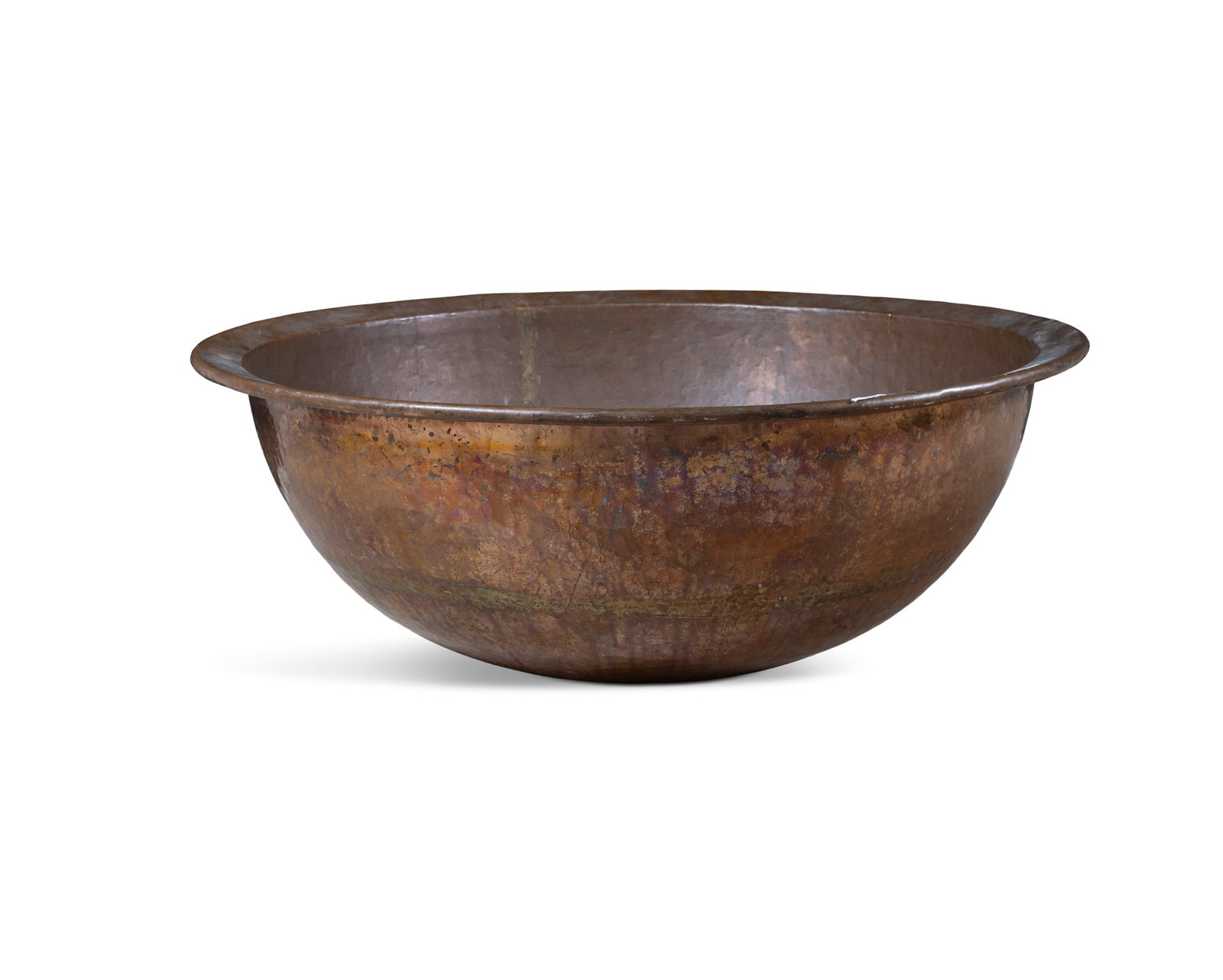 A LARGE BEATEN COPPER BASIN of circular form, 38cm high, 97cm diameter (1 of 3)