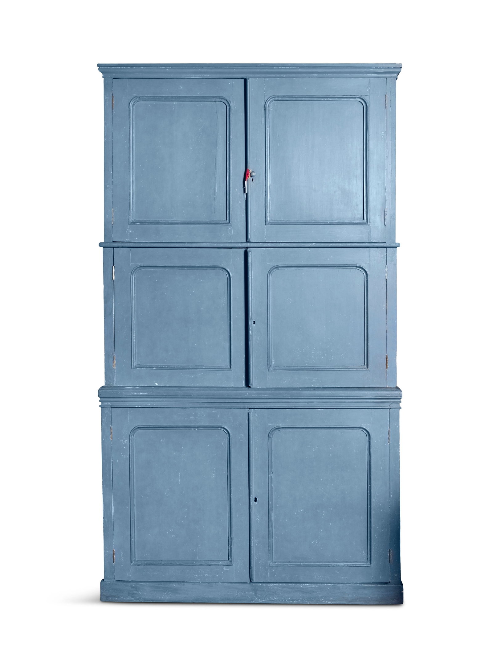 A 19TH CENTURY BLUE PAINTED PINE ESTATE CABINET, outset cornice over three tiers, each with pairs (1 of 3)