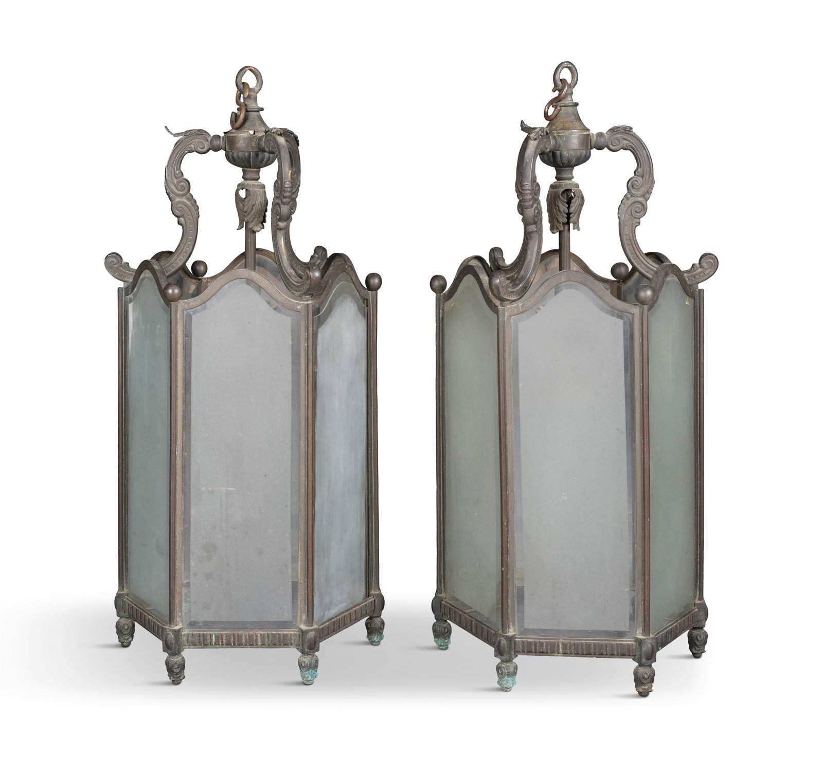 A PAIR OF CAST BRONZE HALL LANTERNS, of hexagonal form, glass panels 80cm high to suspension ring: A PAIR OF CAST BRONZE HALL LANTERNS, of hexagonal form, glass panels 80cm high to suspension ring