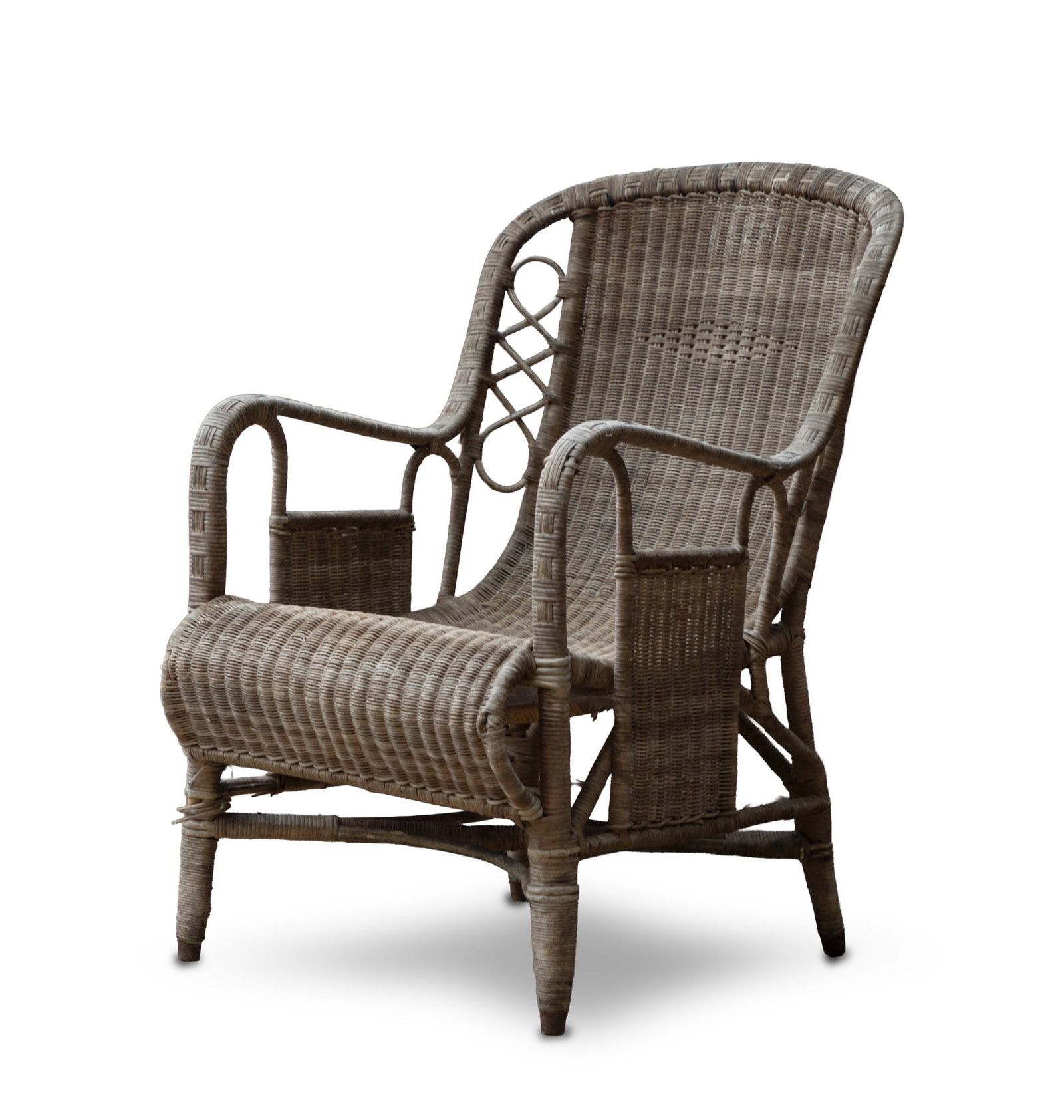 A 19TH CENTURY WICKER ARMCHAIR, the rounded back with open down swept arms with heart decoration. (1 of 2)