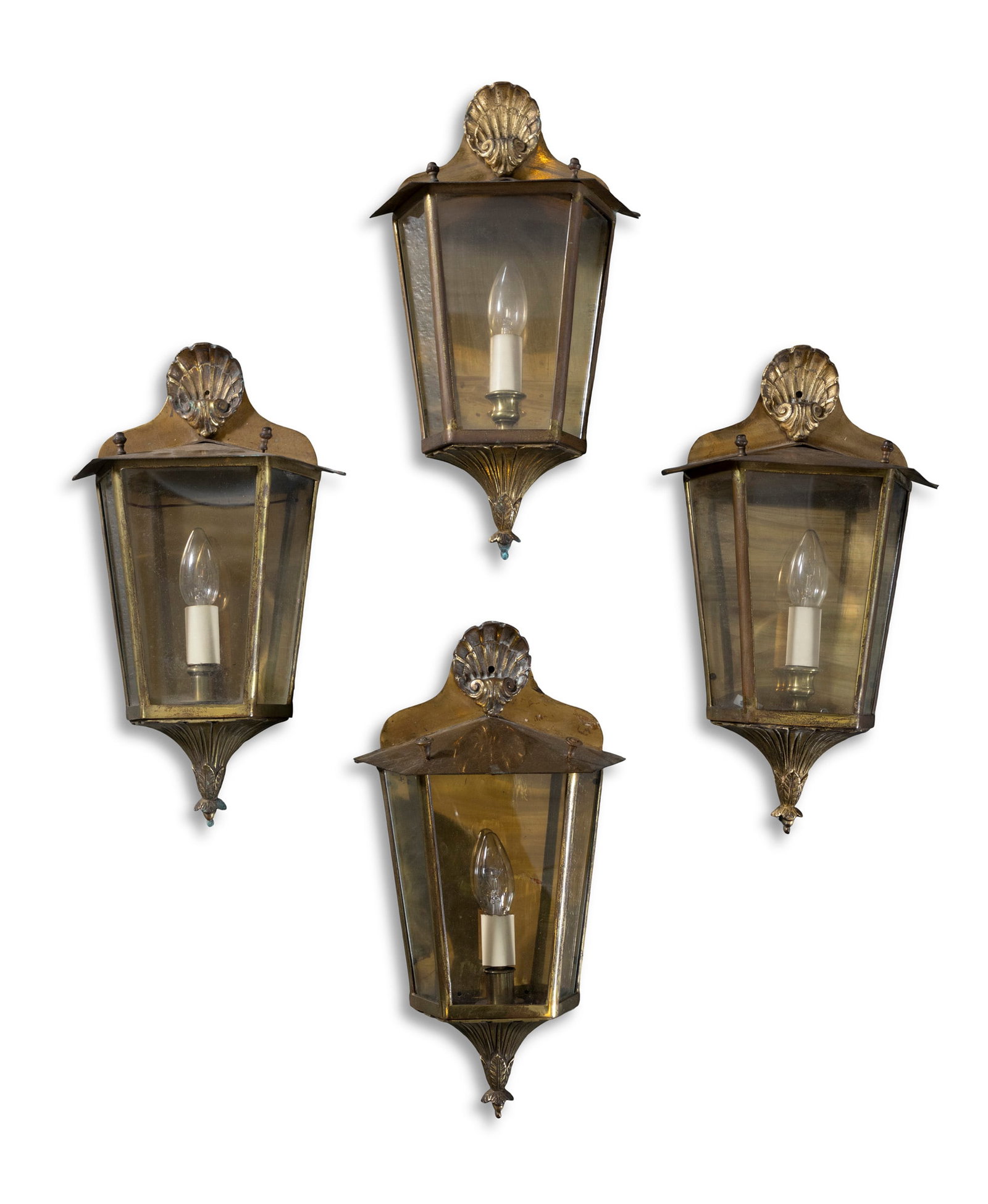 A SET OF FOUR WALL LANTERNS with scallop shell mounts and glazed panels, 43cm high: A SET OF FOUR WALL LANTERNS with scallop shell mounts and glazed panels, 43cm high