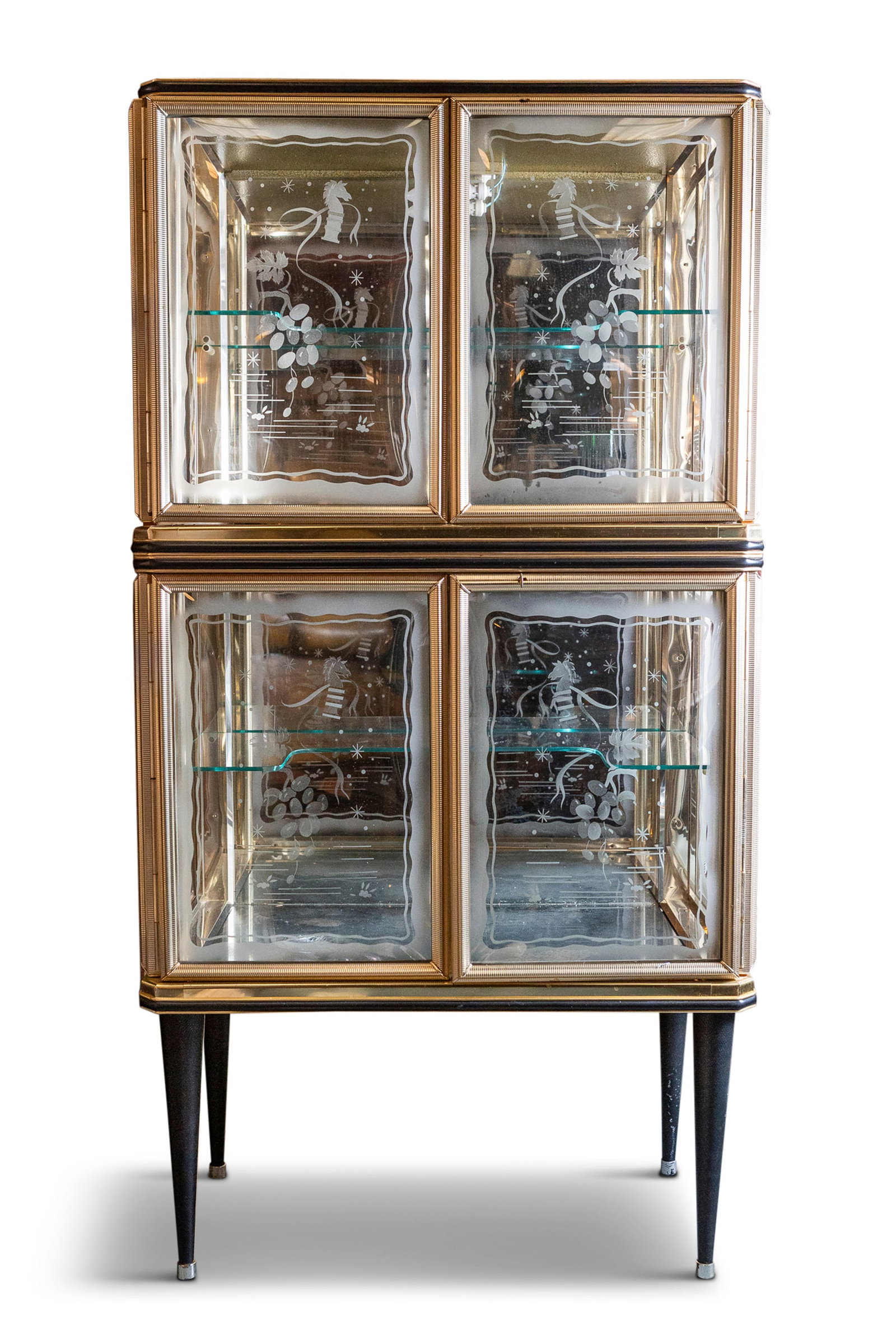 A BRASS AND LACQUERED MID-CENTURY BAR CABINET of upright form, with four glazed doors, enclosing a (1 of 2)