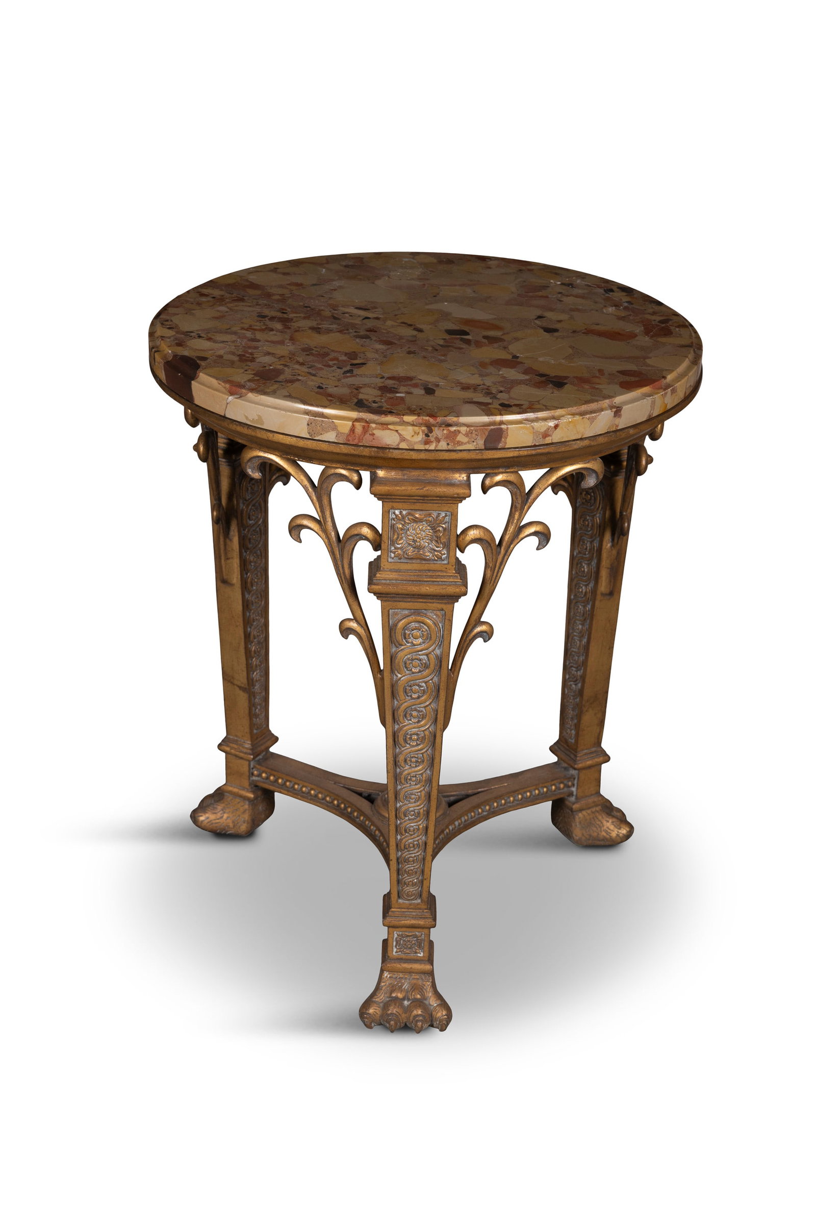 A MARBLE TOPPED AND GILT METAL TABLE the circular top over tapered square supports with spiral: A MARBLE TOPPED AND GILT METAL TABLE the circular top over tapered square supports with spiral carved decoration on lion paw feet joined by concave stretcher, 72cm high, 60cm diameter