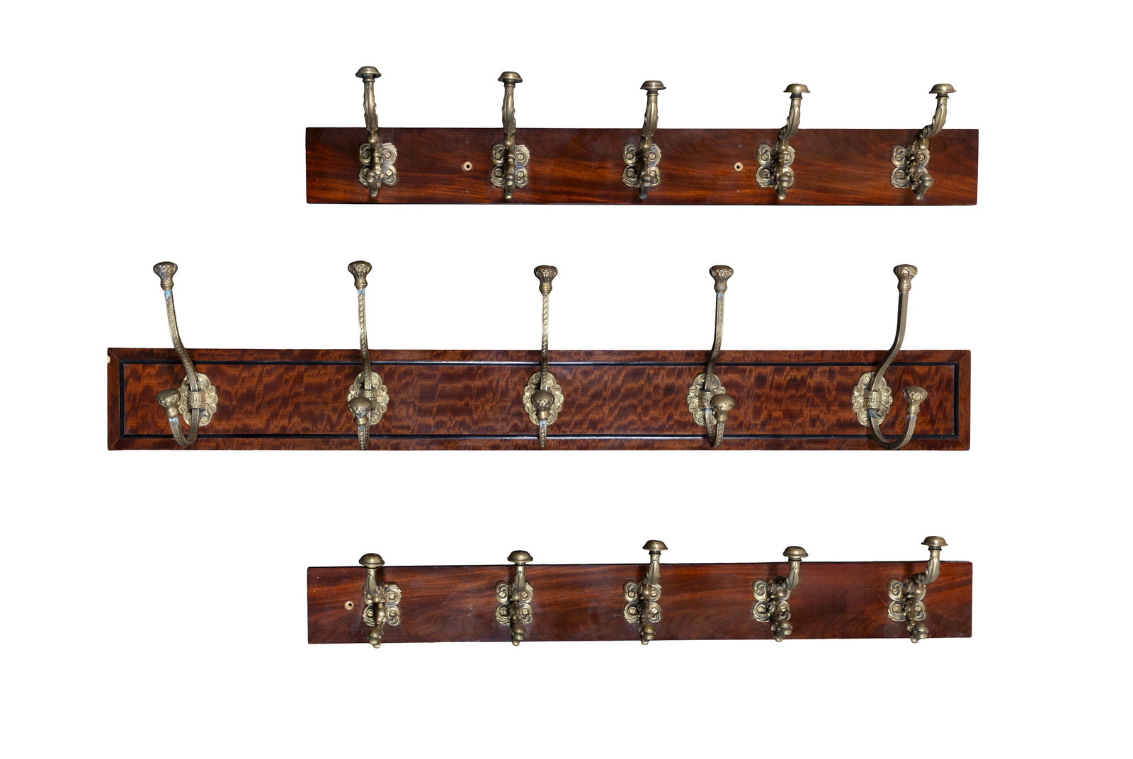 A COLLECTION OF THREE BRASS MOUNTED COAT RACKS comprising a pair, with rectangular panel back, (1 of 4)