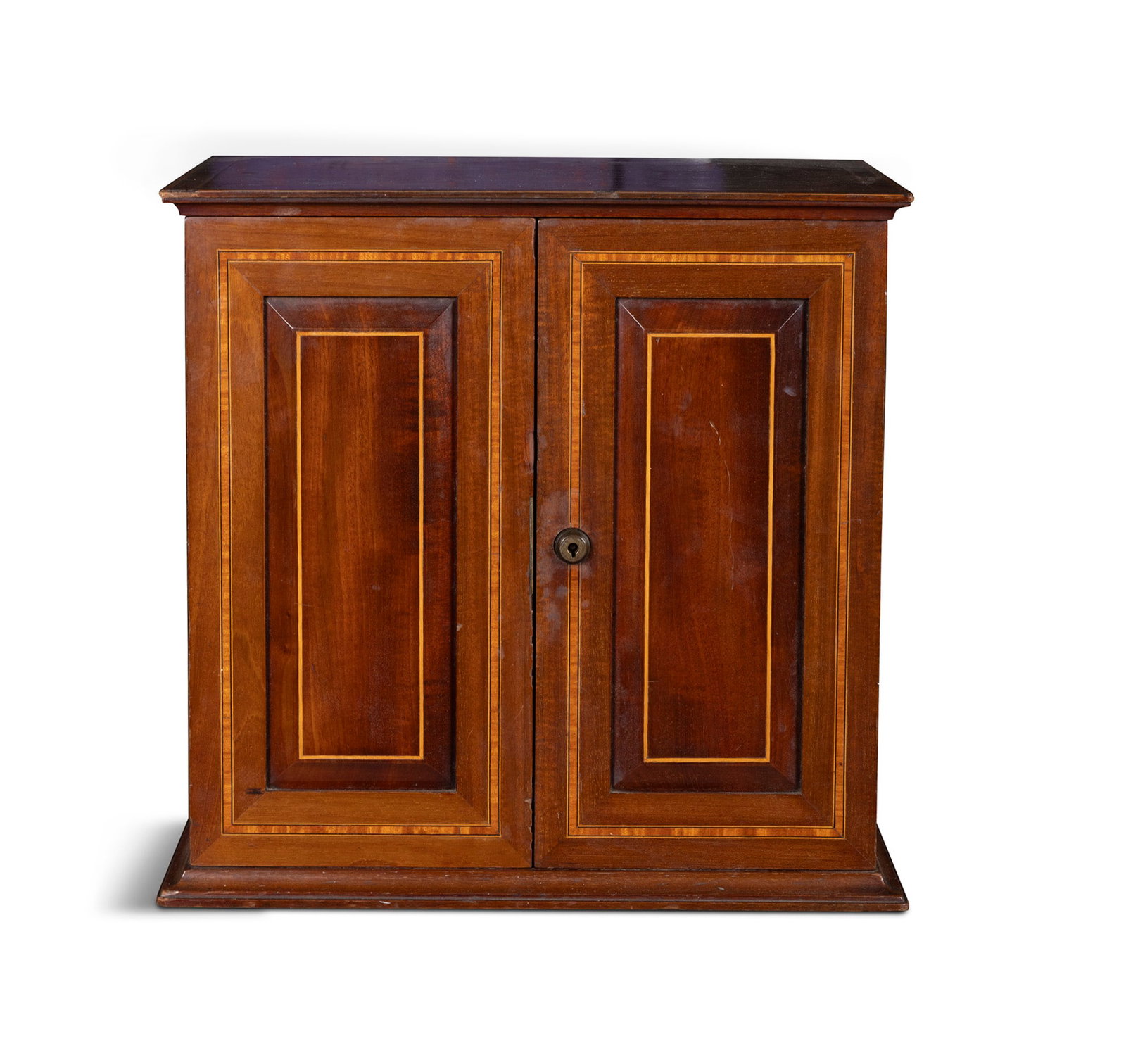 A MINIATURE SATINWOOD INLAID MAHOGANY CAMPAIGN BOX, with side carrying handles, fielded panel: A MINIATURE SATINWOOD INLAID MAHOGANY CAMPAIGN BOX, with side carrying handles, fielded panel doors opening to reveal a fitted interior of drawers and a swivel front panel. 35cm high x 36.5cm wide x 2