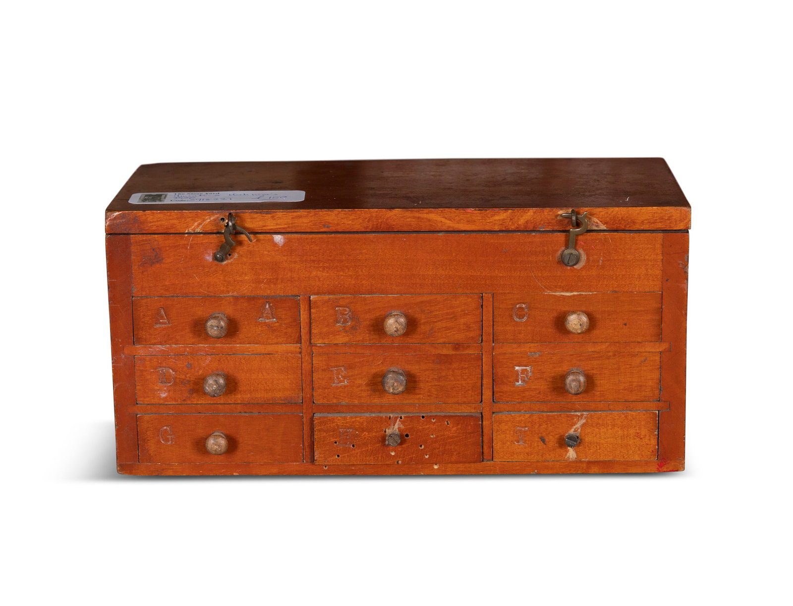 A MINIATURE WATCHMAN'S BOX, with lift top, compartmented interior over a 9 drawer section, 10.5cm (1 of 3)