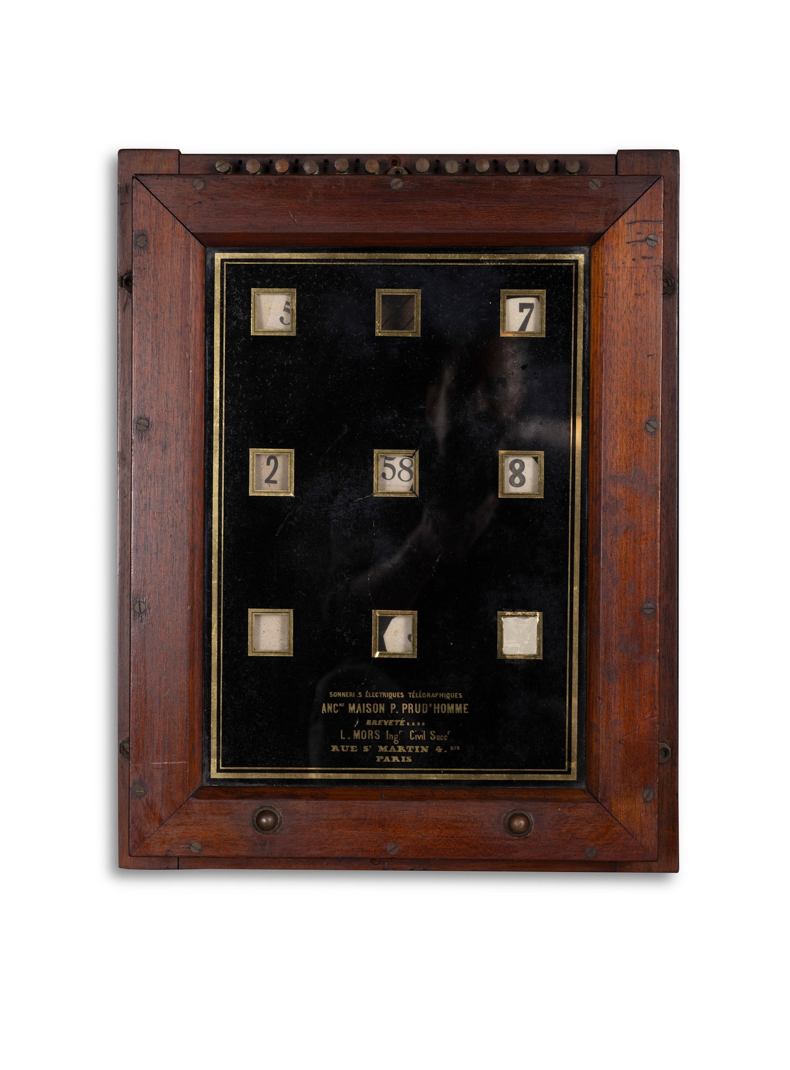 A FRENCH MAHOGANY FRAMED SERVANT'S BELL INDICATOR BOX, BY MORS L. SOCIETE D'ELECTRICIT, PARIS: A FRENCH MAHOGANY FRAMED SERVANT'S BELL INDICATOR BOX, BY MORS L. SOCIETE D'ELECTRICIT, PARIS upright rectangular form, glazed panel with individual room numbers, 51.5 x 40cm