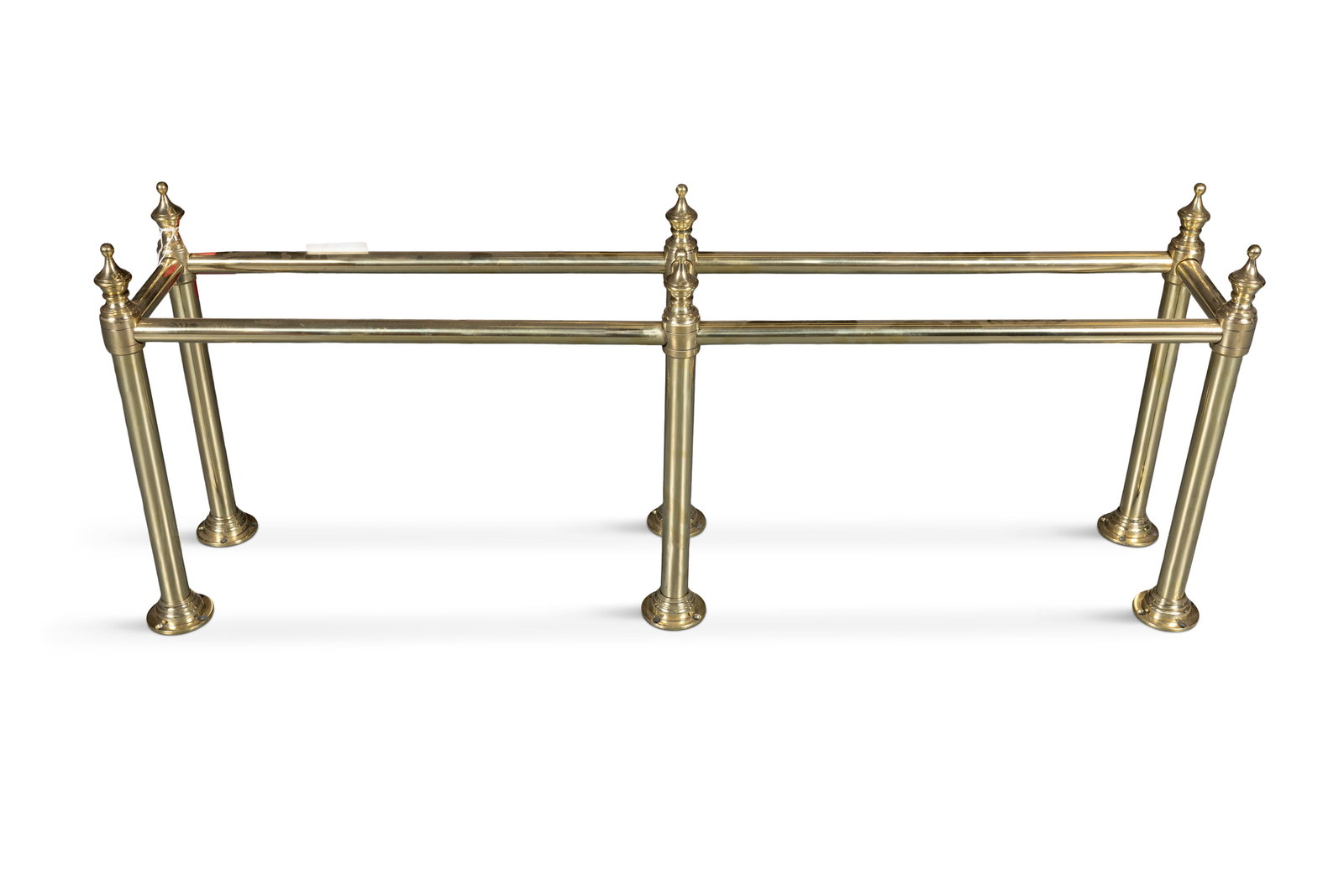 A 19TH CENTURY BRASS SHOP FITTING PIECE, in two sections, long rectangular form with upright (1 of 2)
