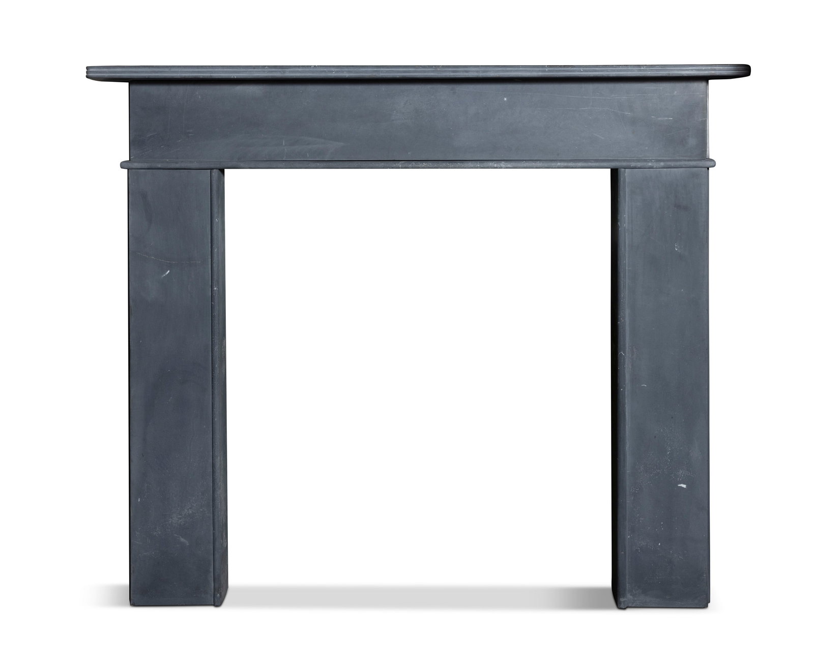 AN IRISH BLUE LIMESTONE FIREPLACE, Interior; 111cm high, 100cm wide, 21cm deep Exterior; 138cm (1 of 2)