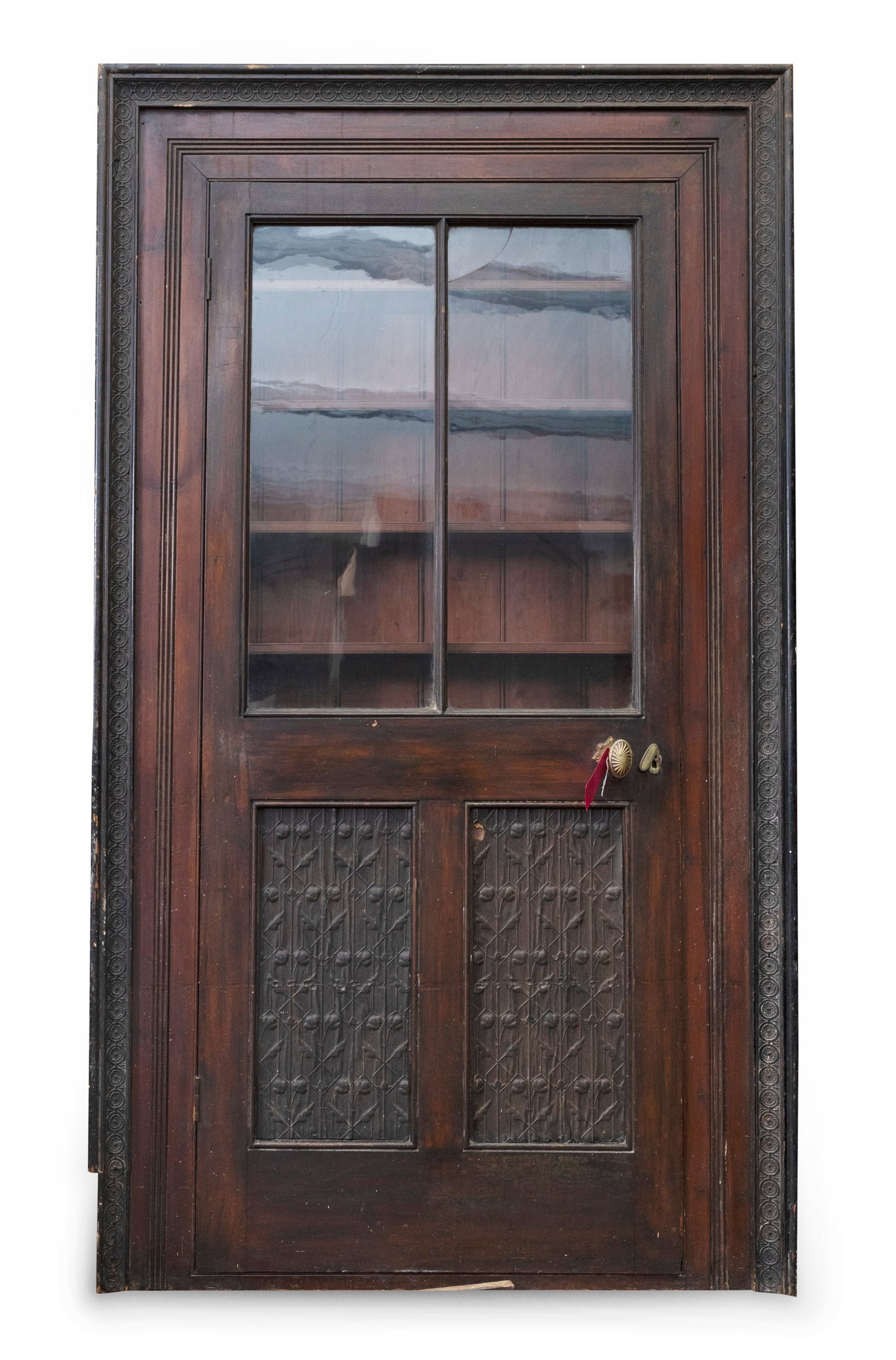 AN UNUSUAL STAINED PINE SHELVED BOOKCASE, Of seven shelves and twin fielded panelled and glazed (1 of 2)