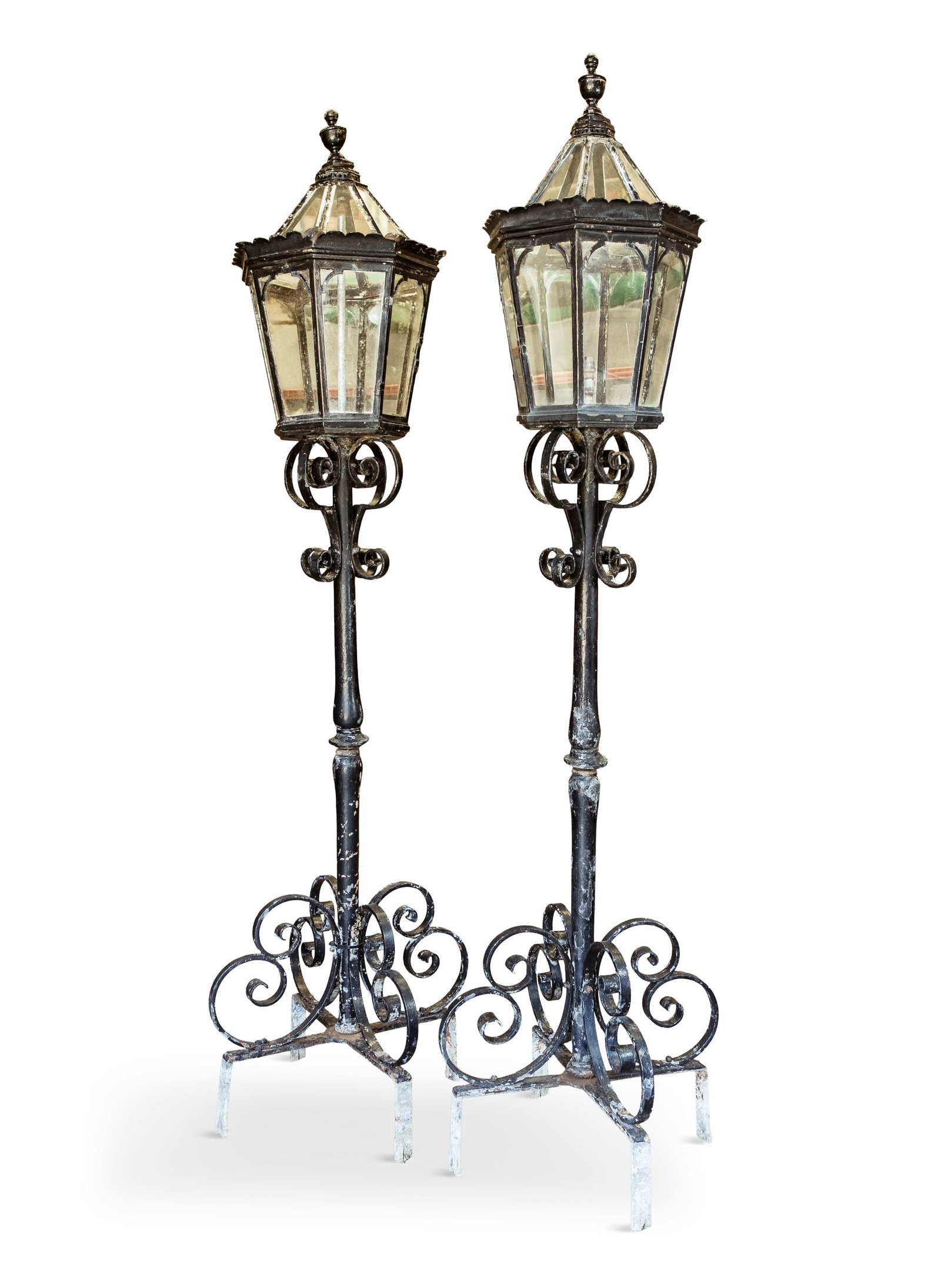 A LARGE PAIR OF COPPER GARDEN LANTERNS, with arched tops surmounted by urn finials, over glazed (1 of 2)