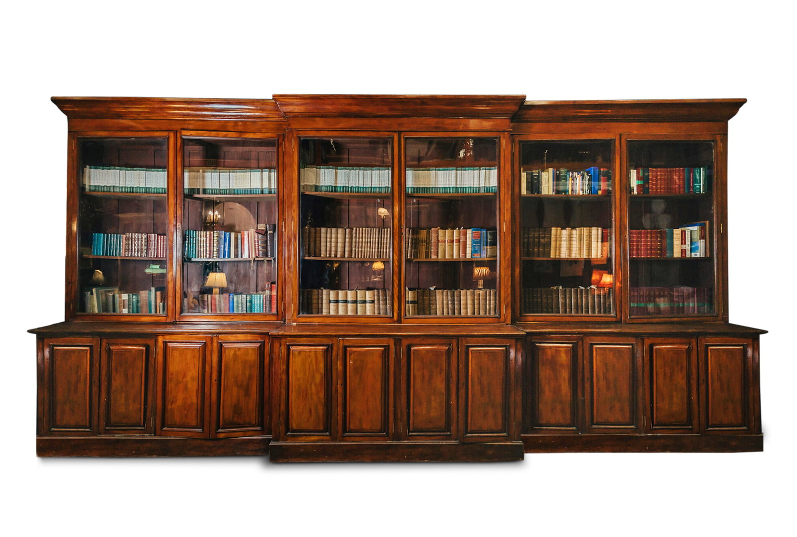 A LARGE MAHOGANY TRIPLE BREAKFRONT BOOKCASE, 19TH CENTURY the moulded cornice over a plain frieze (1 of 1)