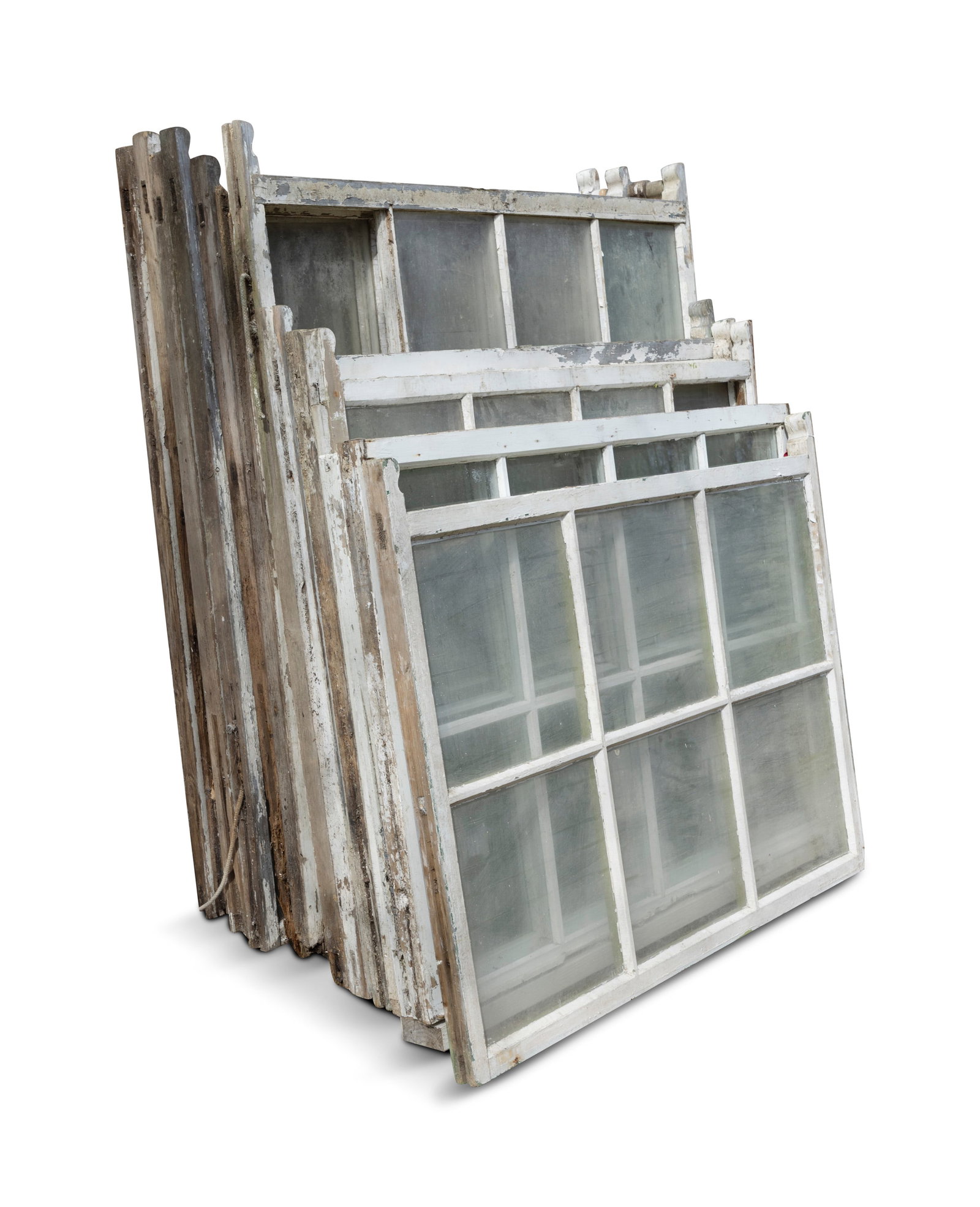 A SELECTION OF SIXTEEN SALVAGED WHITE-PAINTED SASH WINDOWS, Of timber construction and each of six: A SELECTION OF SIXTEEN SALVAGED WHITE-PAINTED SASH WINDOWS, Of timber construction and each of six panes, of varying sized but generally 112 x 105.5cm