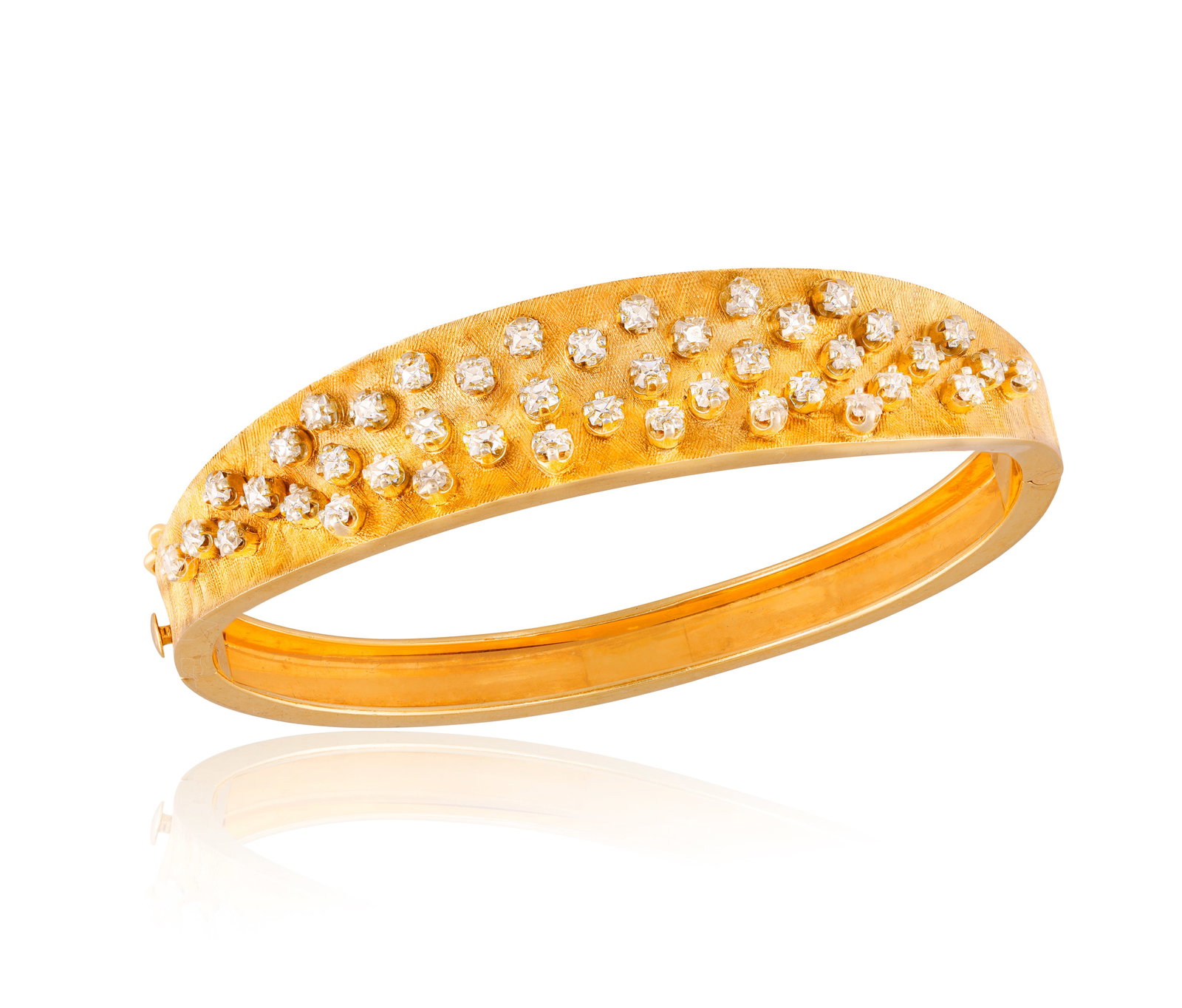 A DIAMOND BANGLE, CIRCA 1960 • Old rectangular-cut diamonds, approx. 1.50cts total • mou (1 of 2)