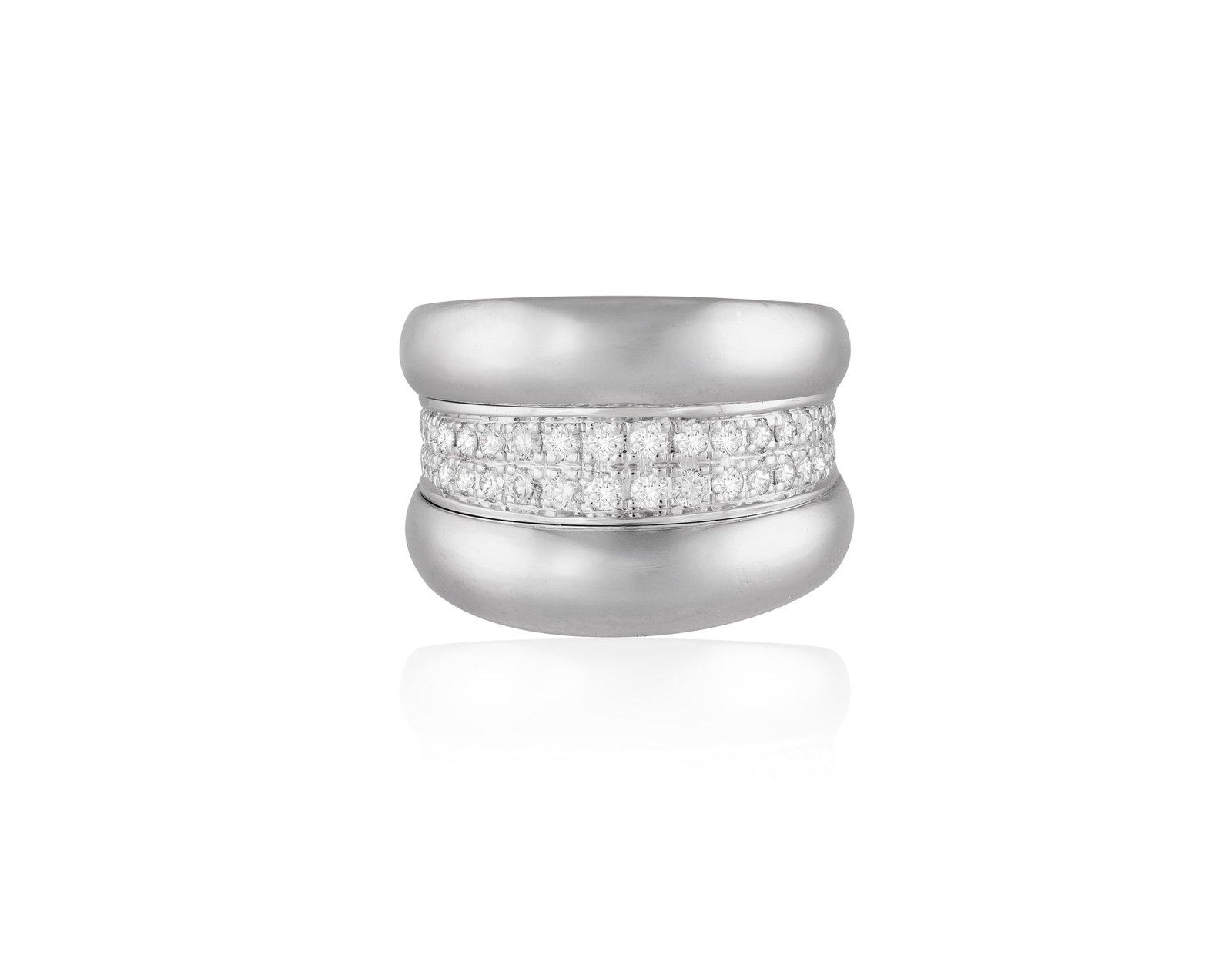 CHOPARD: A DIAMOND BOMBÉ RING • Brilliant-cut diamonds • mounted in 18K gold • (1 of 3)