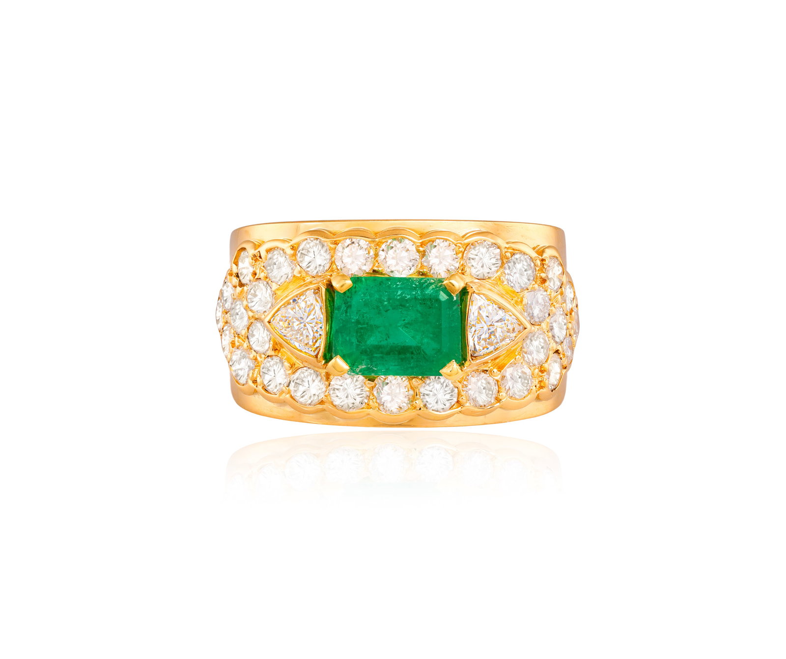 AN EMERALD AND DIAMOND DRESS RING • Rectangular-shaped emerald, approx. 1.70cts • (1 of 3)