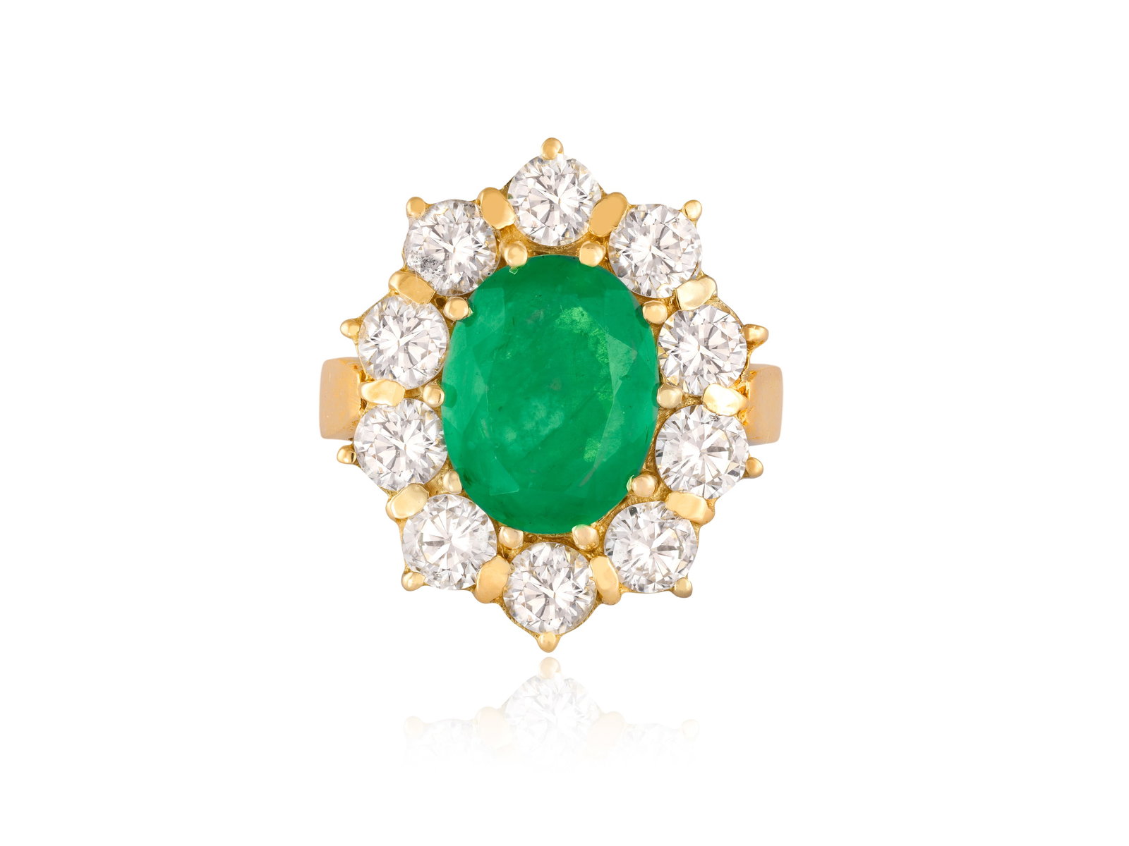 AN EMERALD AND DIAMOND CLUSTER RING • Oval-shaped emerald, approx. 3.50cts total • brill (1 of 3)