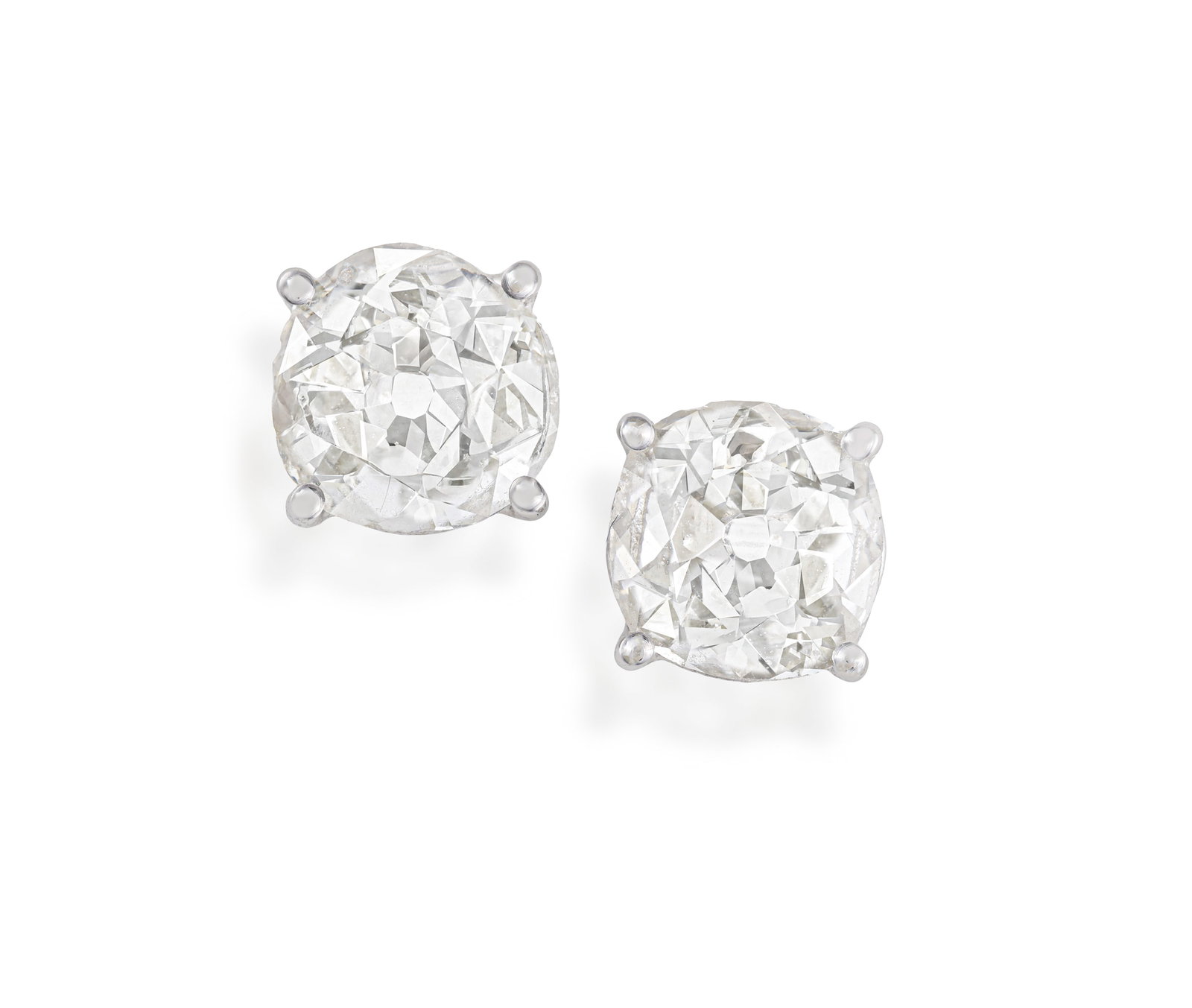 A PAIR OF DIAMOND EARSTUDS • Two old brilliant-cut diamonds, approx. 1.10cts total • (1 of 2)