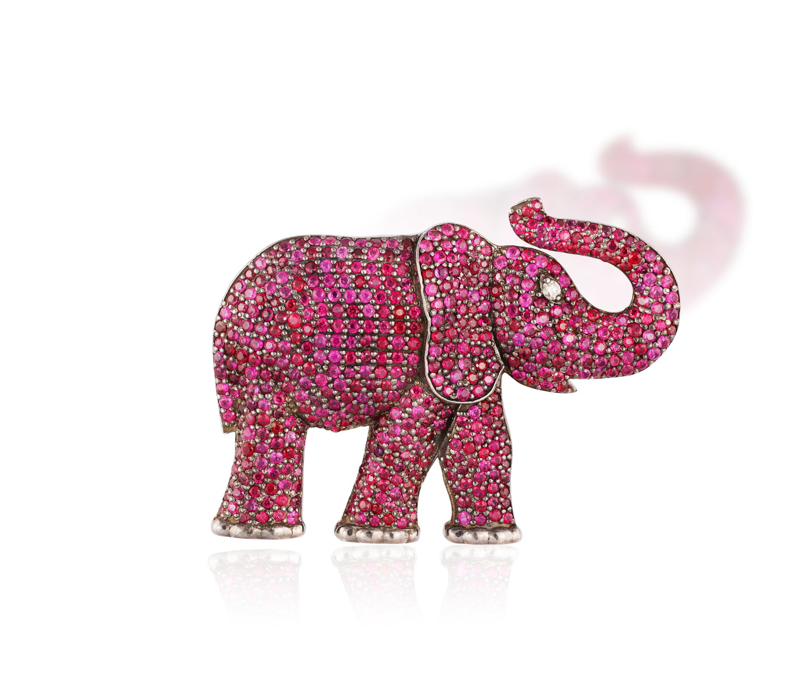 A RUBY AND DIAMOND ELEPHANT PENDANT/BROOCH • Circular-cut rubies, approximately 4.00cts total (1 of 2)
