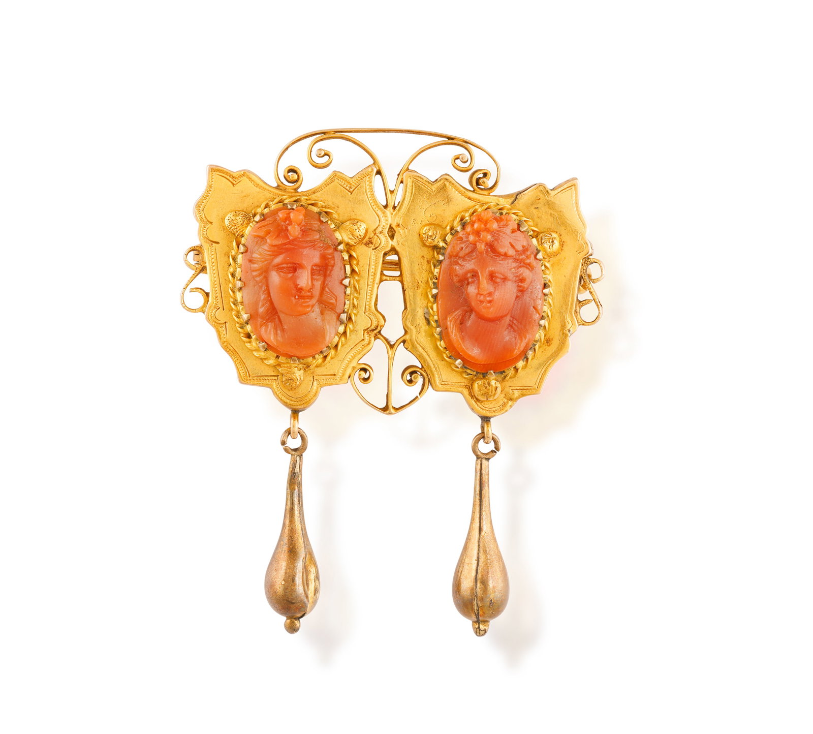 A CORAL CAMEO BROOCH • Two cameos depicting female figure busts • suspending fluted pend (1 of 2)