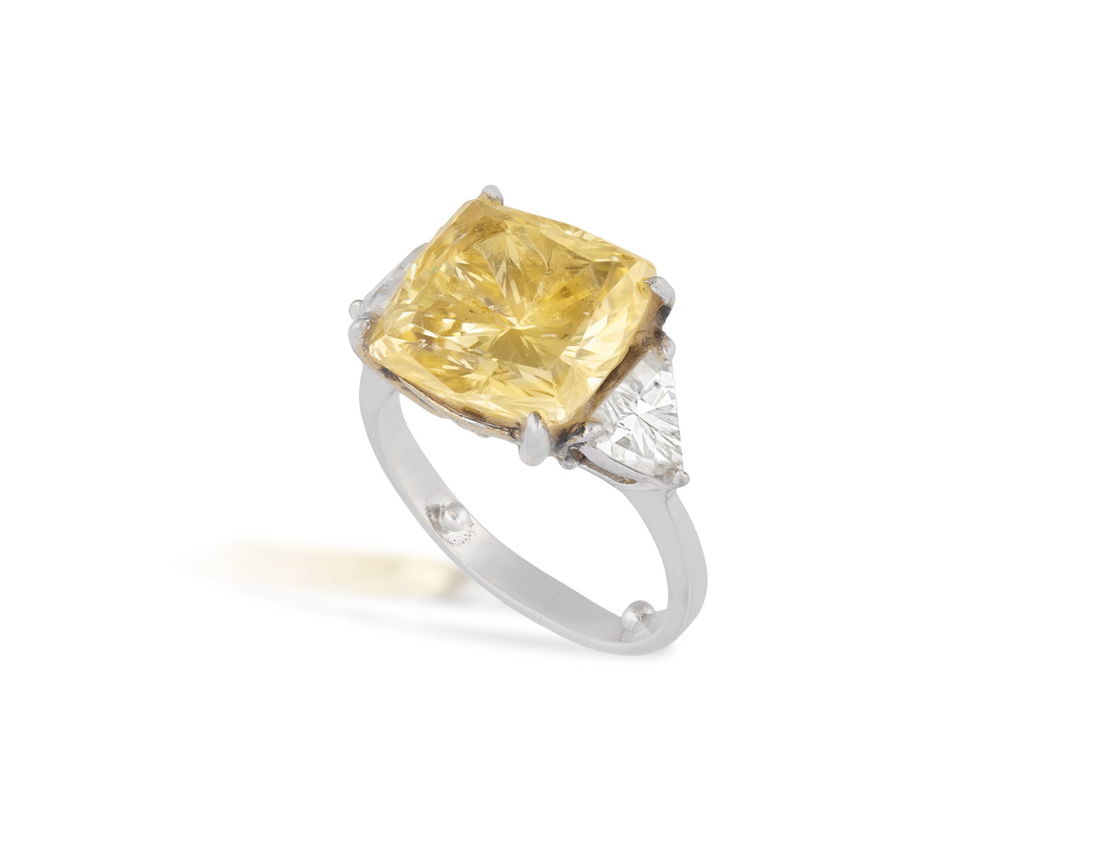 A SYNTHETIC RUTILE AND CUBIC ZIRCONIA DRESS RING • Cushion-shaped yellow synthetic rutile R (1 of 2)